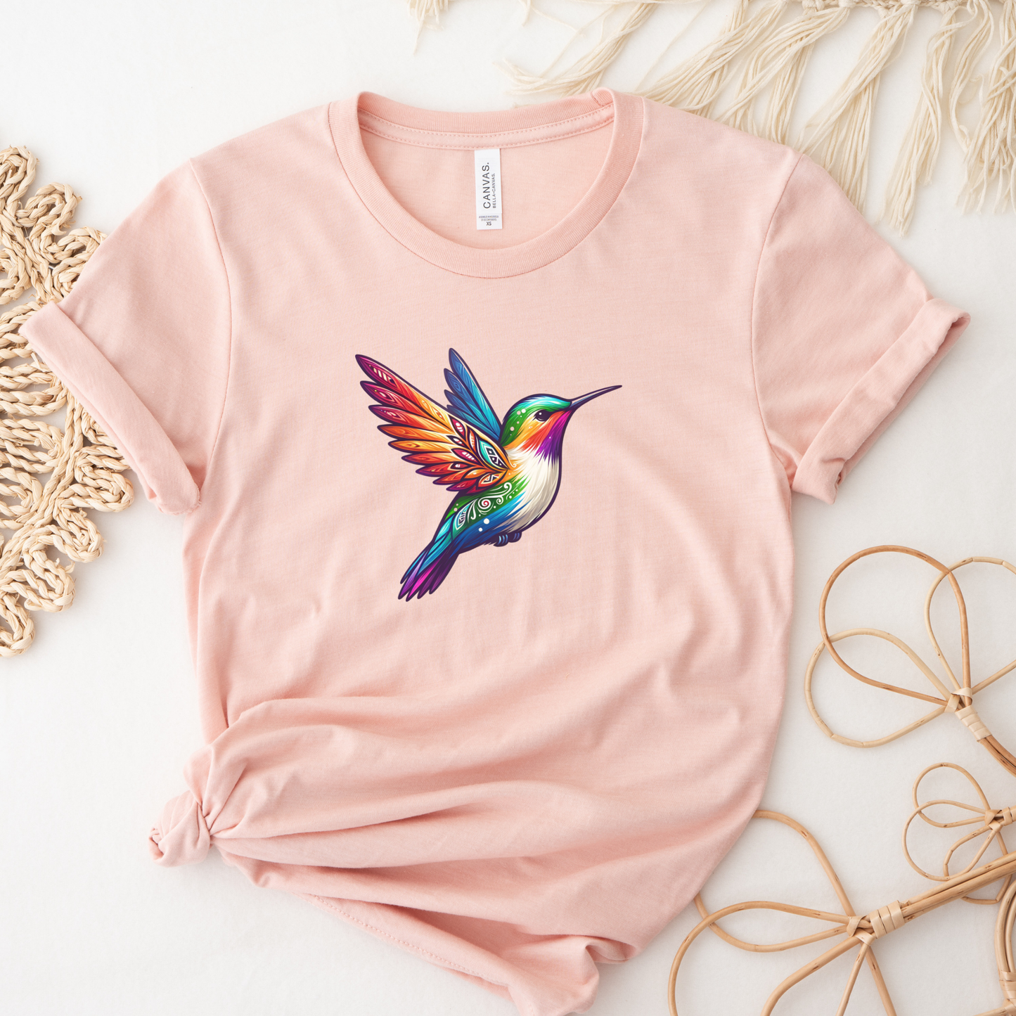 Colourful Indigenous Pride hummingbird design on t-shirt featuring rainbow feathers and Indigenous-inspired artwork. Indigenous Pride Shirt, Indigenous Hummingbird Shirt, LGBTQ2S+ Indigenous Apparel, Pride Hummingbird Tee, Indigenous Clothing Canada, Rainbow Hummingbird Shirt, Indigenous Designed Apparel, Native Pride Shirt, Indigenous LGBTQ Shirt