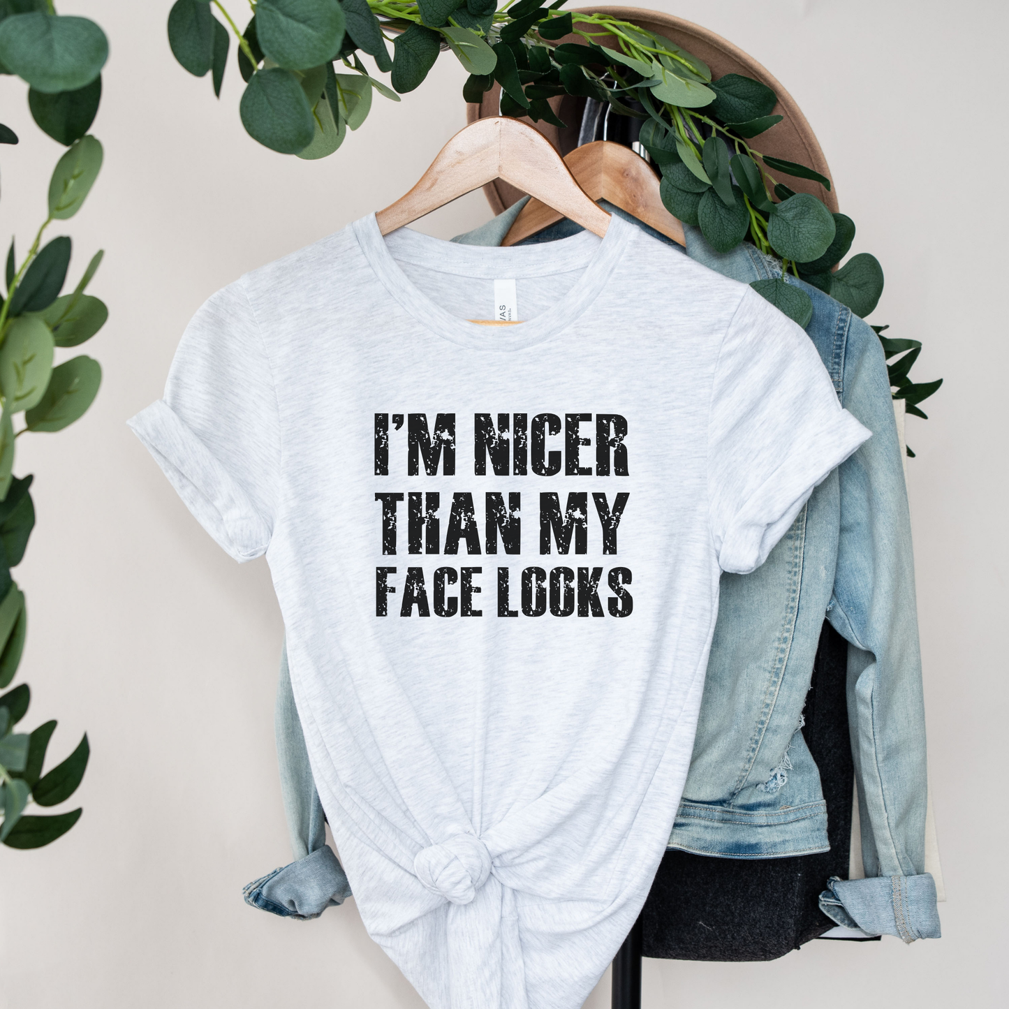 graphic t-shirt with distressed grunge text reading I’m Nicer Than My Face Looks. Funny graphic tee, sarcastic shirt, grunge text shirt, introvert shirt, funny saying t-shirt, vintage grunge tee, resting face shirt, funny women’s graphic tee, sarcastic apparel, trendy graphic shirt
