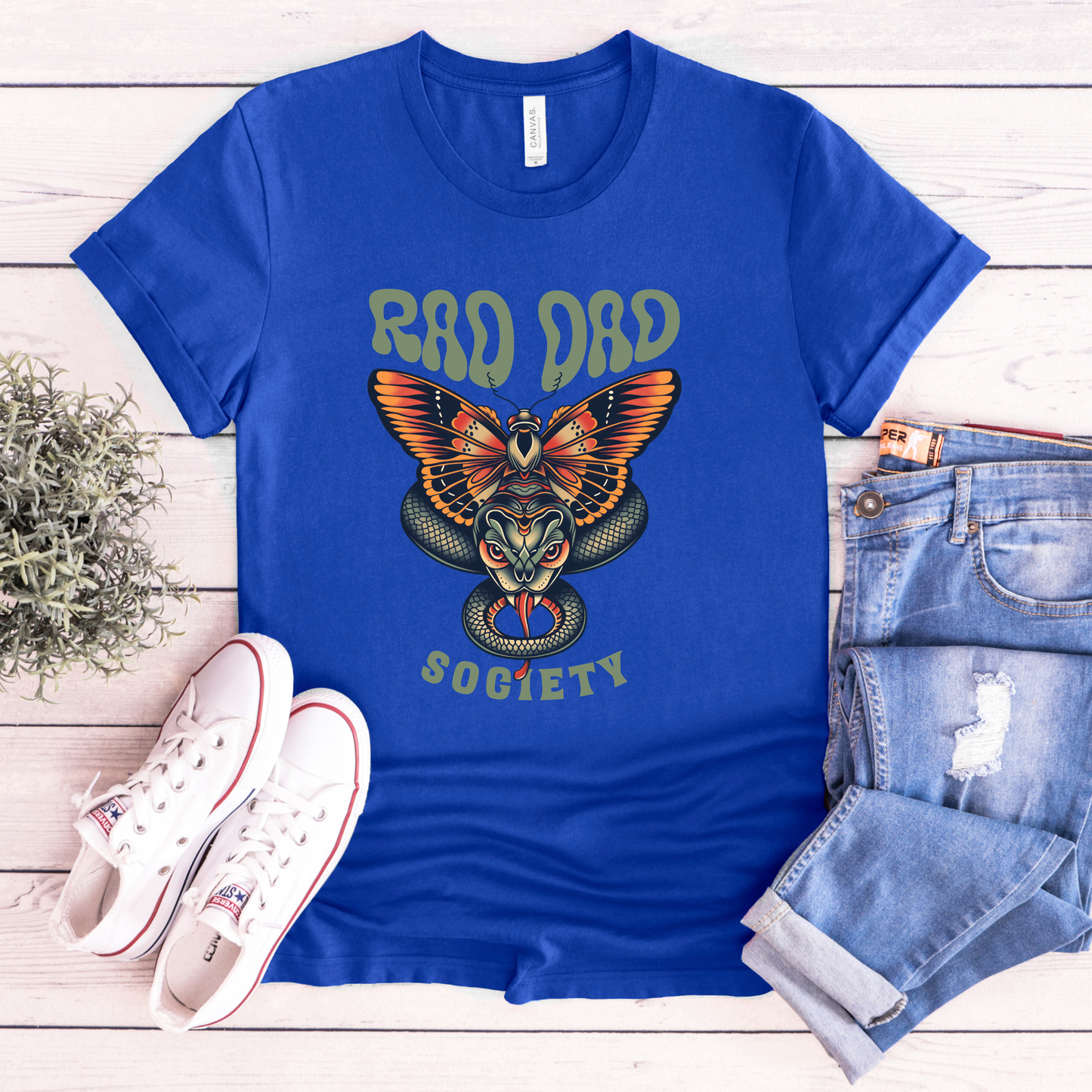 Rad Dad Society shirt with moth and snake graphic on a unisex t-shirt.rad dad society, dad shirt, graphic tee, retro dad shirt, unisex t-shirt, moth and snake design, cool dad shirt, father gift, bold dad apparel, vintage style tee, unique dad shirt, everyday casual shirt, statement graphic tee, father’s day gift, rad dad tee