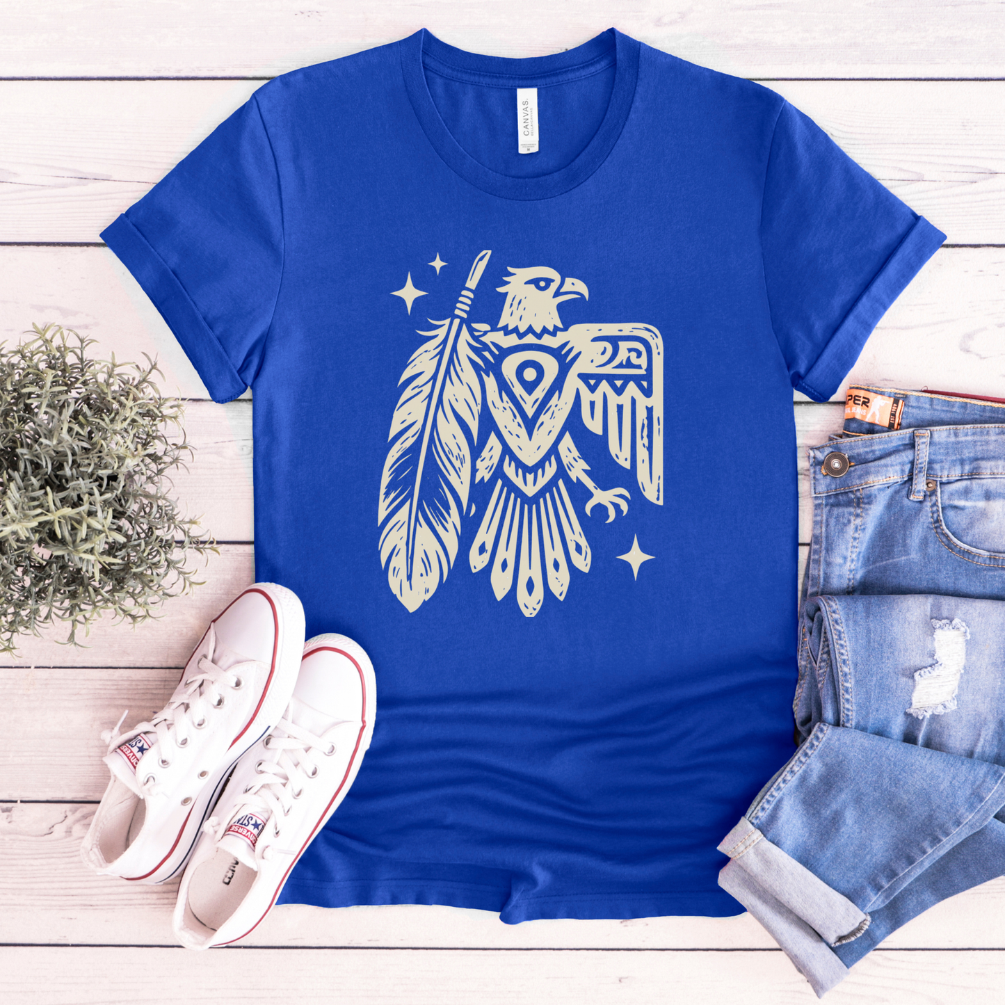Thunderbird Feather graphic t-shirt featuring a cream-colored bird and feather illustration on a shirt. Thunderbird Shirt, Feather Shirt, Eagle Graphic Tee, Indigenous Inspired, Nature Shirt, Forest Green Tee, Graphic T-Shirt, Symbolic Art, Outdoor Apparel, Cultural Apparel, Unisex Shirt, Wilderness Style, Native Inspired Art, Bird Graphic Shirt, Heritage Design, Statement Tee, Gift For Nature Lover, Outdoor Lifestyle, Spiritual Symbolism, Casual Graphic Tee