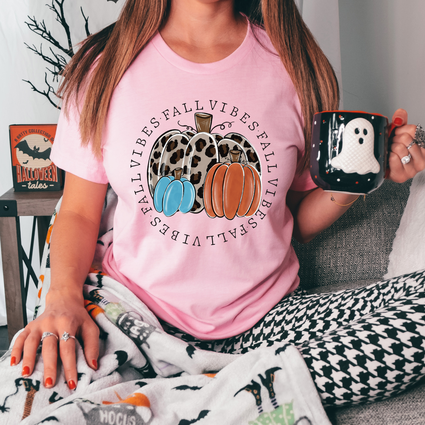 t-shirt featuring decorative pumpkins in autumn colors surrounded by circular "Fall Vibes" text, creating a cozy seasonal design perfect for fall lovers. fall vibes shirt, autumn pumpkin shirt, fall aesthetic t-shirt, pumpkin patch outfit, cozy autumn apparel, pumpkin lover tee, fall festival shirt, thanksgiving clothing, sweater weather shirt, autumn graphic tee, rustic fall fashion, pumpkin spice season apparel, cute fall shirt, fall lover gift, cozy season clothing