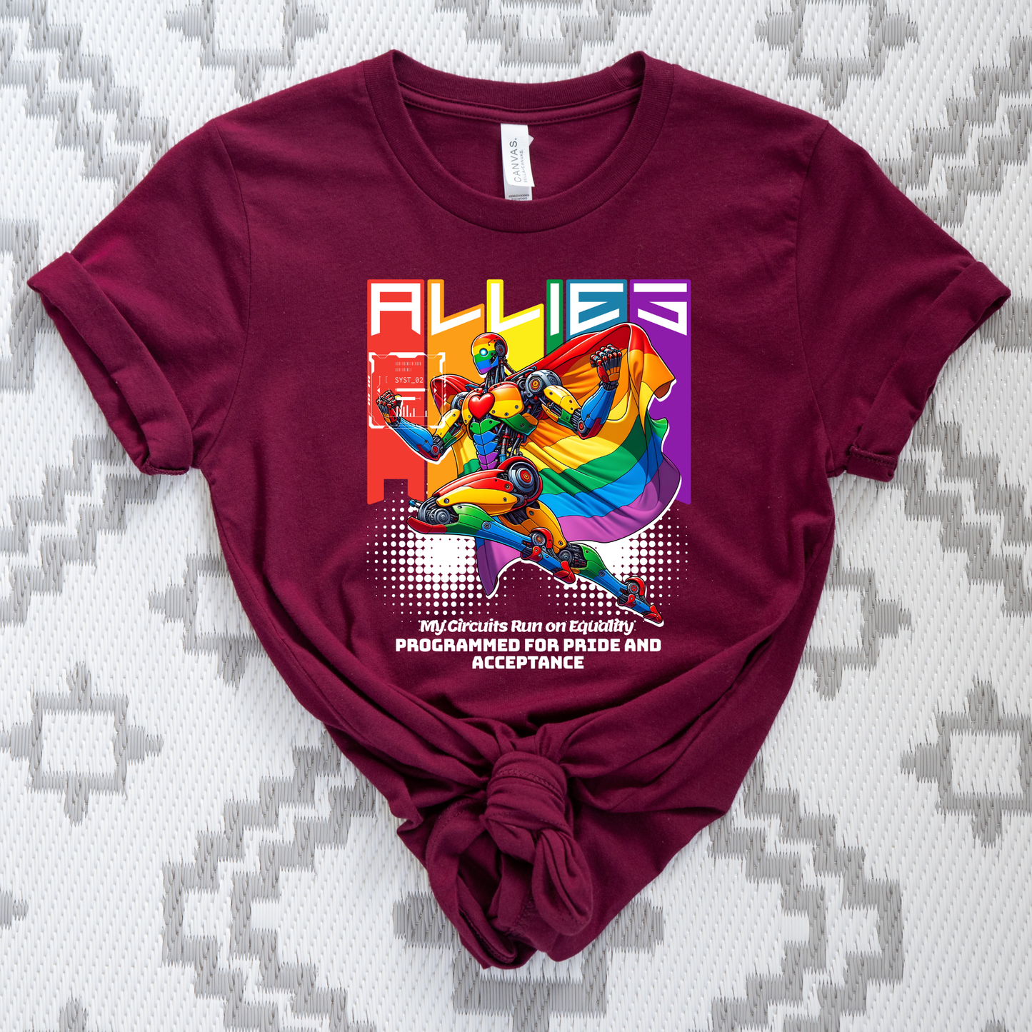 Maroon t-shirt with a colorful graphic and text on a patterned background. allies robot shirt, pride shirt, ally shirt, LGBTQ support tee, rainbow graphic tee, equality shirt, acceptance shirt, unisex graphic tee, pride apparel, colorful robot shirt, statement tee, allyship apparel, inclusive fashion, fun pride shirt, rainbow ally shirt