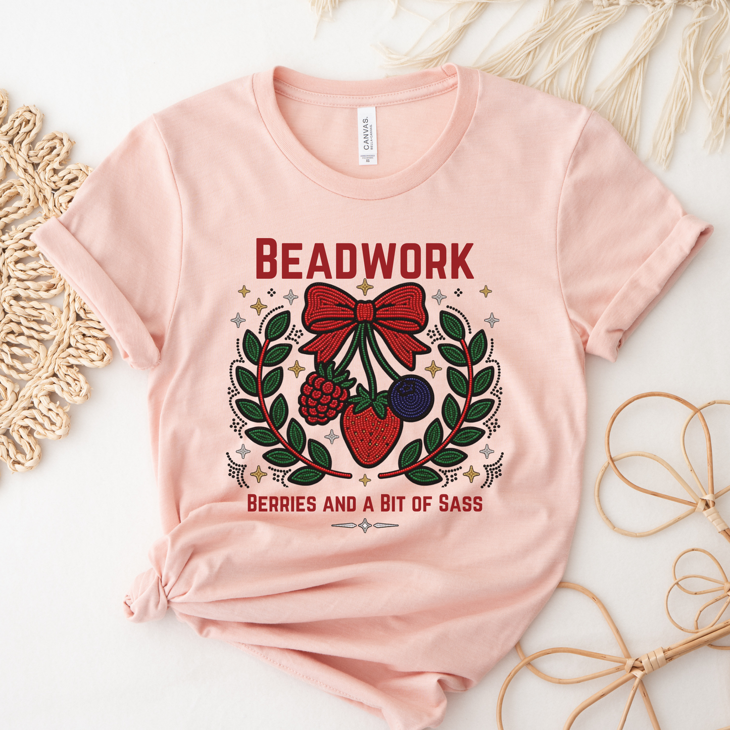 Show your love for Indigenous artistry with our Beadwork, Berries & A Bit of Sass shirt. Featuring a vibrant beadwork-inspired berry design, this soft unisex tee is perfect for powwows, markets, and everyday wear. beadwork shirt, Indigenous beadwork shirt, berry graphic tee, Indigenous fashion, beaded berry shirt, woodland inspired apparel, Indigenous artist shirt, powwow clothing, Indigenous pride shirt, Native inspired graphic tee, strawberry beadwork design, Indigenous gifts, cultural apparel, Indigenous