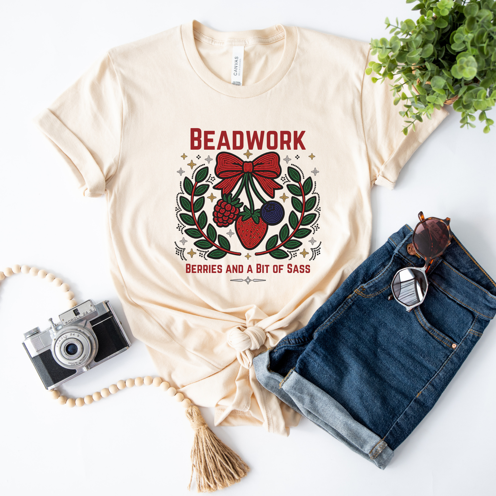 Show your love for Indigenous artistry with our Beadwork, Berries & A Bit of Sass shirt. Featuring a vibrant beadwork-inspired berry design, this soft unisex tee is perfect for powwows, markets, and everyday wear. beadwork shirt, Indigenous beadwork shirt, berry graphic tee, Indigenous fashion, beaded berry shirt, woodland inspired apparel, Indigenous artist shirt, powwow clothing, Indigenous pride shirt, Native inspired graphic tee, strawberry beadwork design, Indigenous gifts, cultural apparel, Indigenous