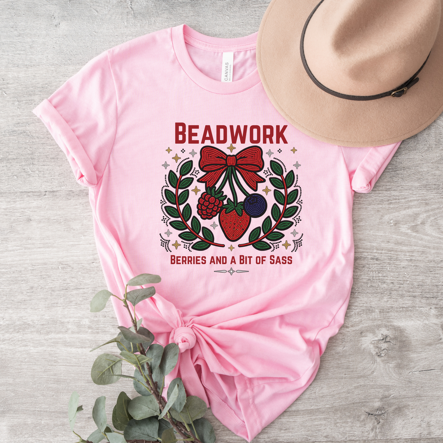Show your love for Indigenous artistry with our Beadwork, Berries & A Bit of Sass shirt. Featuring a vibrant beadwork-inspired berry design, this soft unisex tee is perfect for powwows, markets, and everyday wear. beadwork shirt, Indigenous beadwork shirt, berry graphic tee, Indigenous fashion, beaded berry shirt, woodland inspired apparel, Indigenous artist shirt, powwow clothing, Indigenous pride shirt, Native inspired graphic tee, strawberry beadwork design, Indigenous gifts, cultural apparel, Indigenous