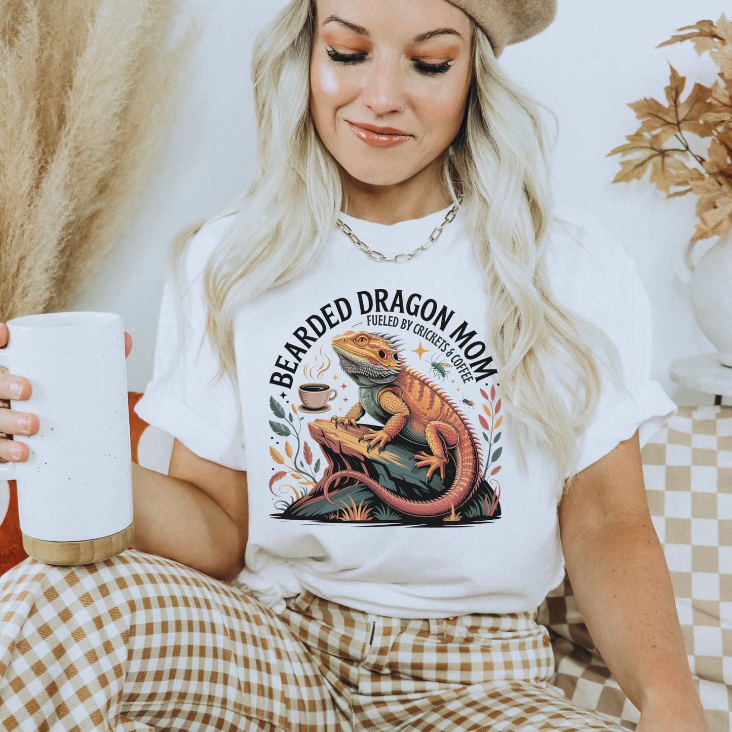 Bearded Dragon Mom Fueled By Crickets and Coffee Shirt featuring a detailed bearded dragon illustration, coffee cup, crickets, and botanical accents. bearded dragon mom shirt, reptile mom shirt, bearded dragon shirt, beardie mom tee, reptile lover shirt, exotic pet shirt, coffee lover shirt, bearded dragon gift, reptile owner gift, lizard shirt, reptile apparel, beardie owner shirt, crickets and coffee shirt, exotic animal lover, pet mom shirt, reptile enthusiast gift, dragon mom shirt, reptile keeper shirt