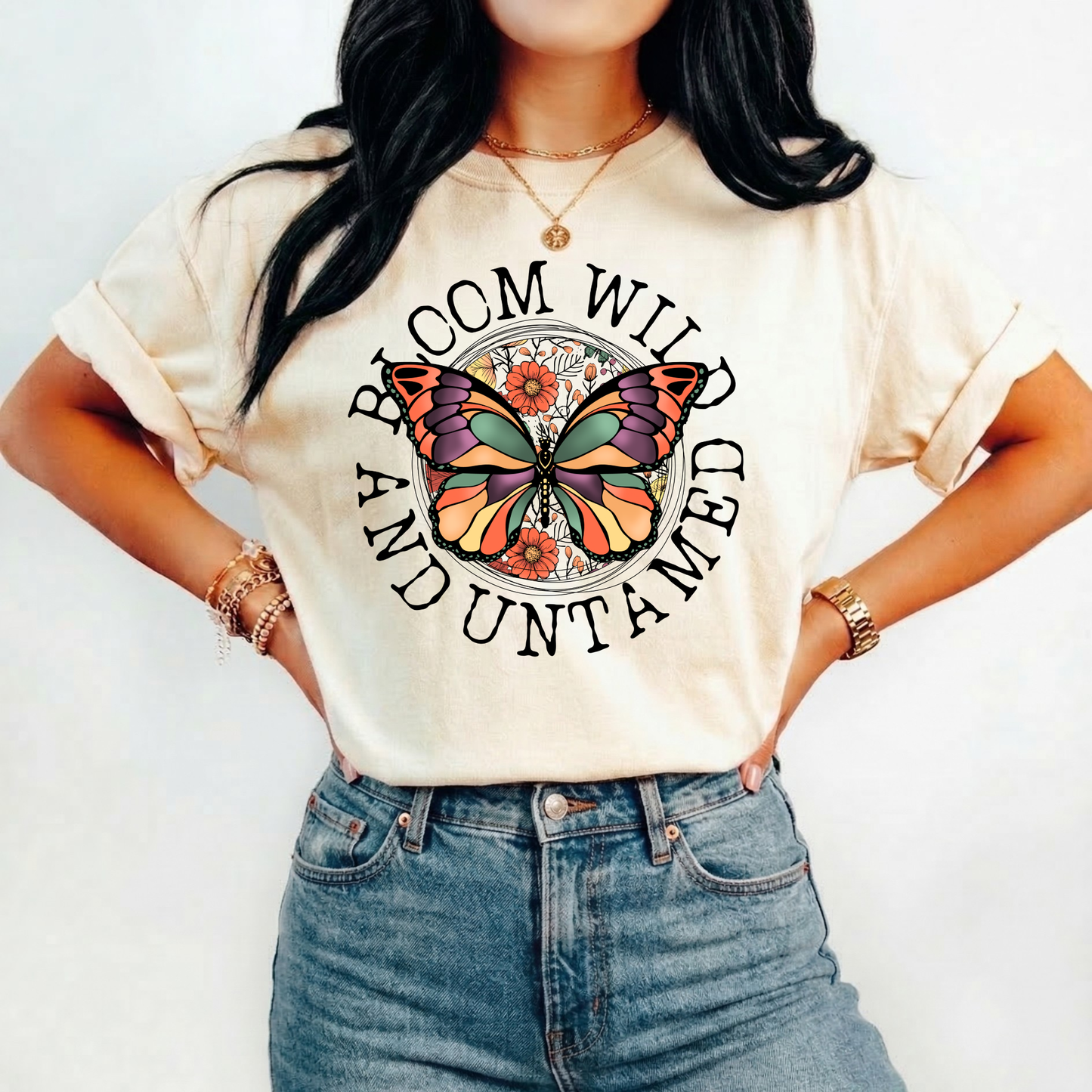 Bloom Wild And Untamed Butterfly shirt with butterfly graphic and inspirational text on a unisex tee. bloom wild and untamed, butterfly shirt, inspirational shirt, nature graphic tee, unisex t shirt, floral butterfly shirt, free spirit shirt, statement tee, everyday graphic tee, gift idea shirt, uplifting apparel, feminine butterfly tee