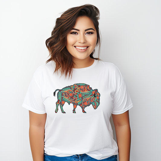 Woman wearing a white t-shirt with a colorful bison design on a plain background. native floral buffalo shirt, indigenous buffalo shirt, floral buffalo tee, indigenous design shirt, buffalo graphic tee, native inspired apparel, cultural pride shirt, unisex indigenous tee, floral indigenous shirt, buffalo and floral shirt, indigenous owned clothing, meaningful graphic tee