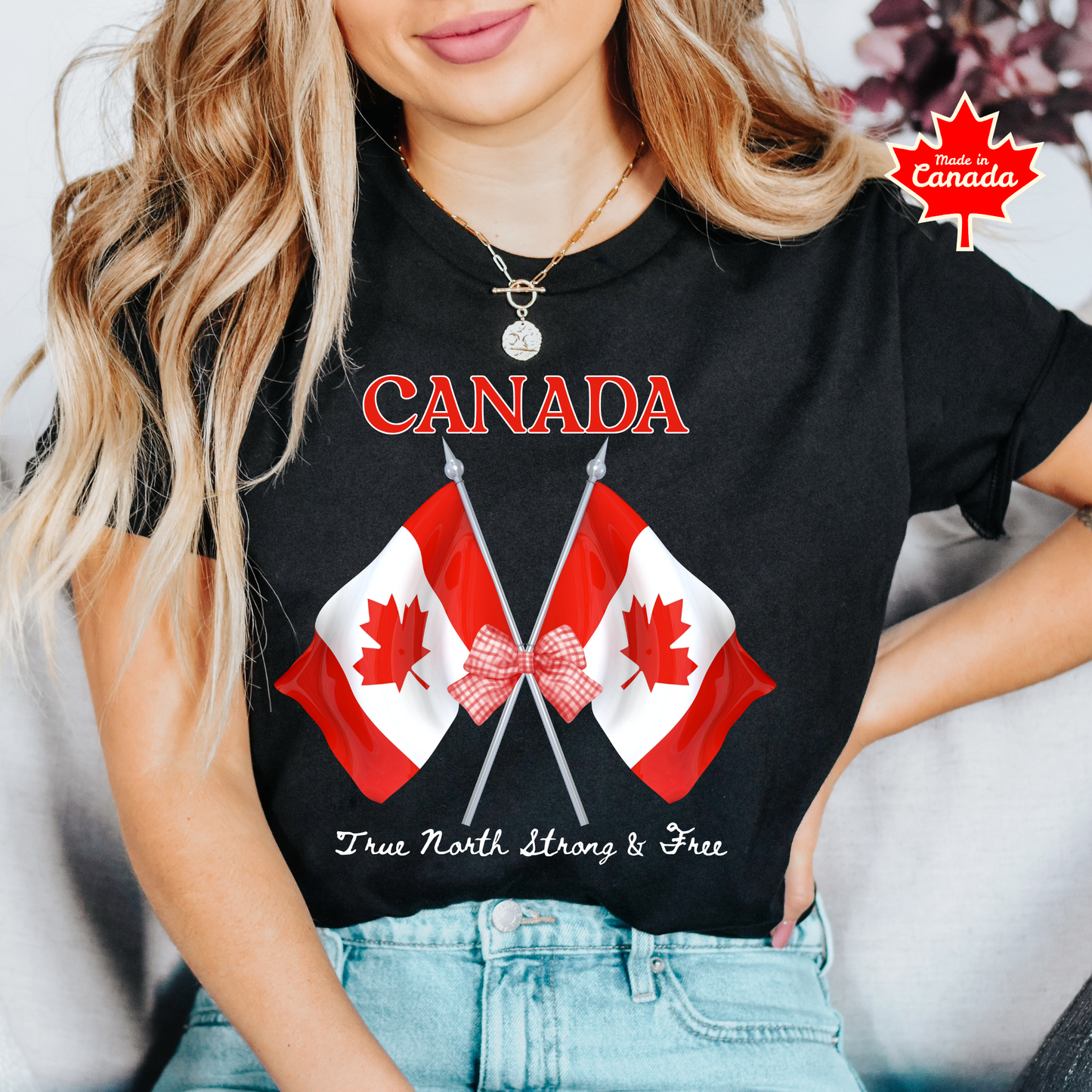 Canada Day Flag Coquette Bow True North Strong and Free Shirt featuring two Canadian flags with a red gingham bow and patriotic Canadian design. canada day shirt, canada shirt, canadian pride shirt, true north strong and free, coquette bow shirt, canada flag shirt, patriotic canada shirt, canada day outfit, canada day apparel, gingham bow shirt, july 1st shirt, canadian clothing, red bow shirt, canada celebration shirt, canadian gift, cute canada shirt, canada day tee, canada flag bow, canada coquette shirt