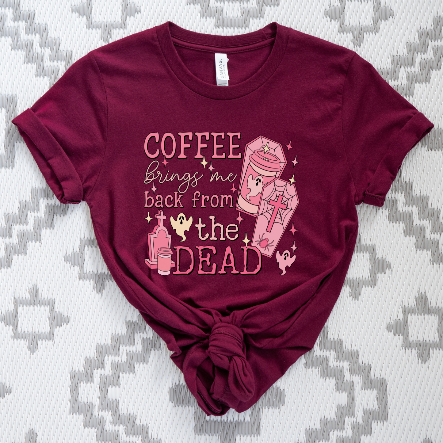 Pink Coffee Brings Me Back From The Dead Shirt featuring cute ghosts, coffee cups, coffins, stars, and spooky aesthetic artwork. coffee shirt, coffee lover shirt, spooky coffee shirt, halloween coffee shirt, ghost shirt, cute ghost shirt, pink halloween shirt, coffee brings me back from the dead, spooky cute shirt, barista shirt, fall shirt, halloween apparel, coffee aesthetic shirt, gothic cute shirt, pink ghost shirt, caffeine lover gift, spooky season shirt, witchy coffee shirt, halloween lover gift