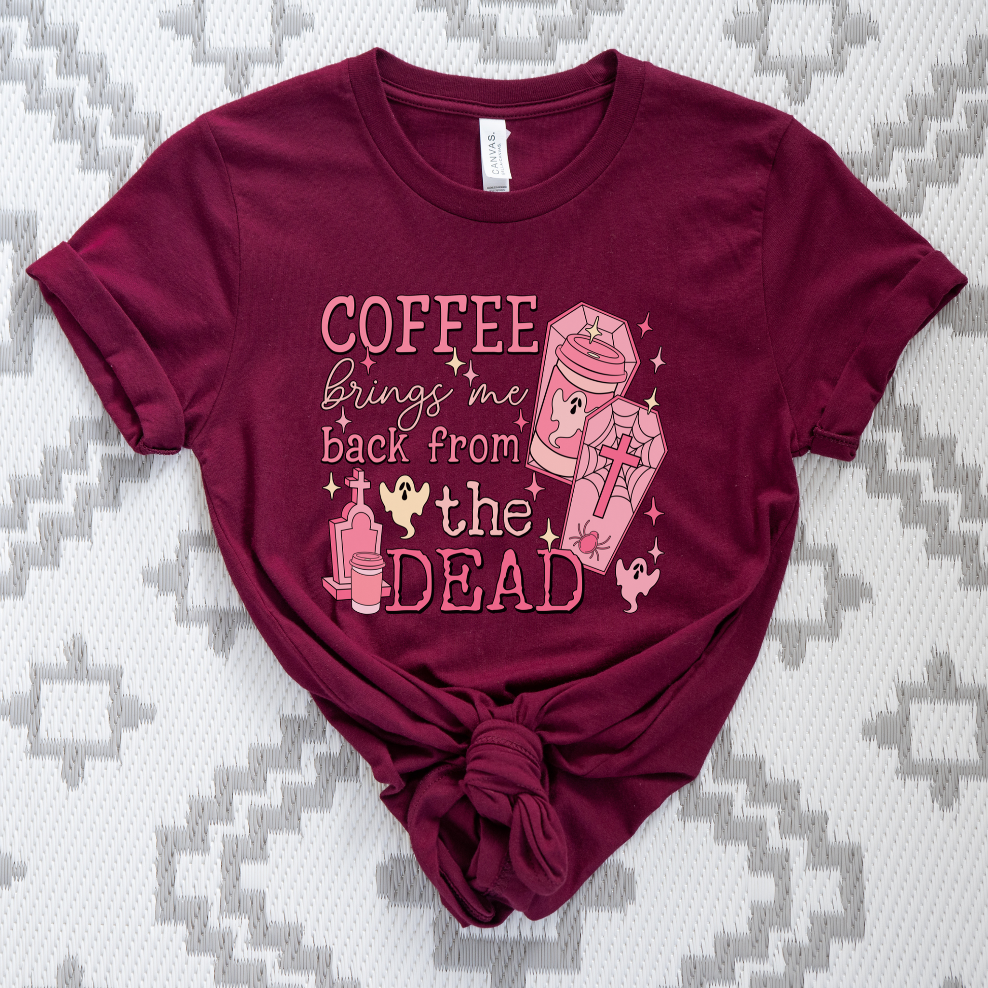 Pink Coffee Brings Me Back From The Dead Shirt featuring cute ghosts, coffee cups, coffins, stars, and spooky aesthetic artwork. coffee shirt, coffee lover shirt, spooky coffee shirt, halloween coffee shirt, ghost shirt, cute ghost shirt, pink halloween shirt, coffee brings me back from the dead, spooky cute shirt, barista shirt, fall shirt, halloween apparel, coffee aesthetic shirt, gothic cute shirt, pink ghost shirt, caffeine lover gift, spooky season shirt, witchy coffee shirt, halloween lover gift