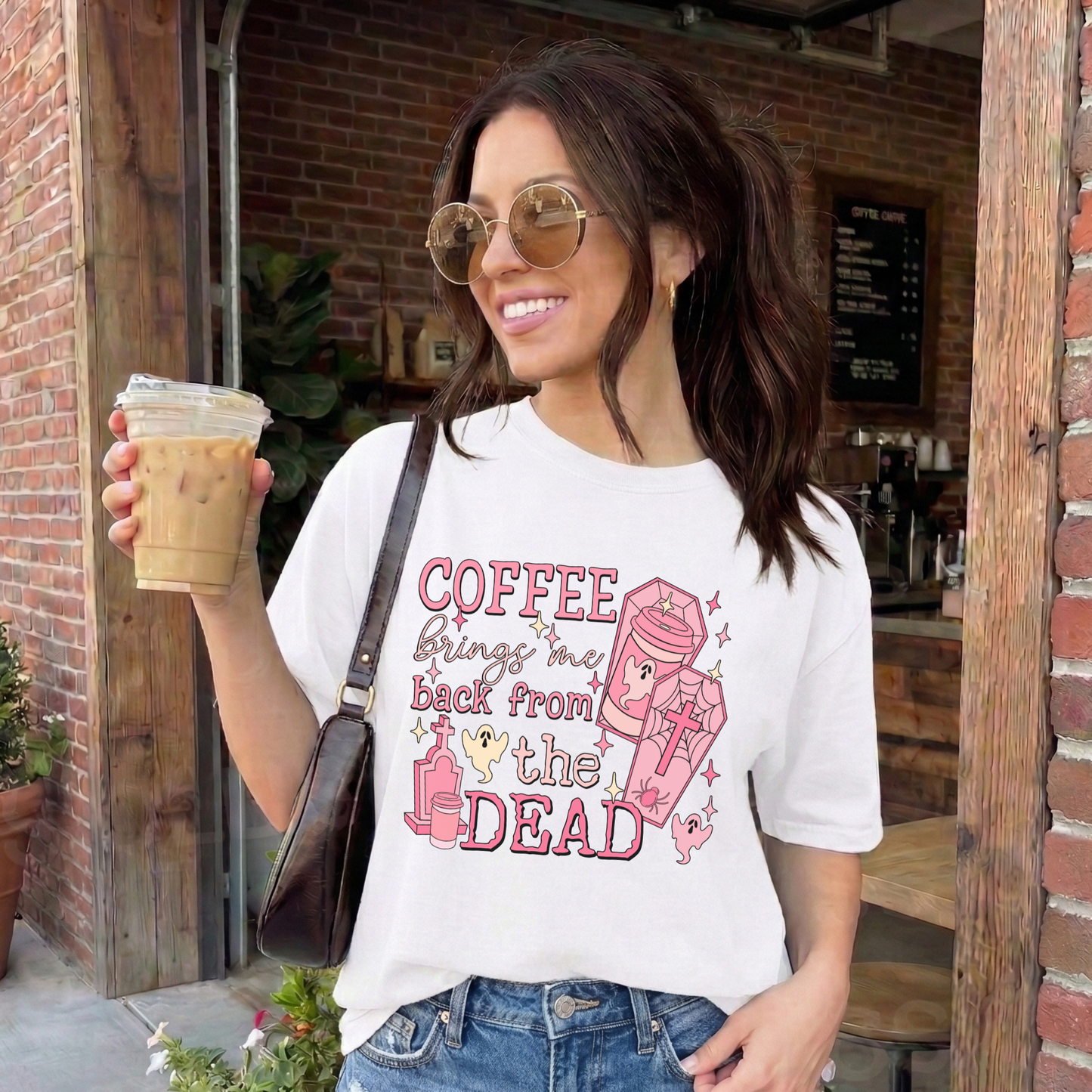 Pink Coffee Brings Me Back From The Dead Shirt featuring cute ghosts, coffee cups, coffins, stars, and spooky aesthetic artwork. coffee shirt, coffee lover shirt, spooky coffee shirt, halloween coffee shirt, ghost shirt, cute ghost shirt, pink halloween shirt, coffee brings me back from the dead, spooky cute shirt, barista shirt, fall shirt, halloween apparel, coffee aesthetic shirt, gothic cute shirt, pink ghost shirt, caffeine lover gift, spooky season shirt, witchy coffee shirt, halloween lover gift