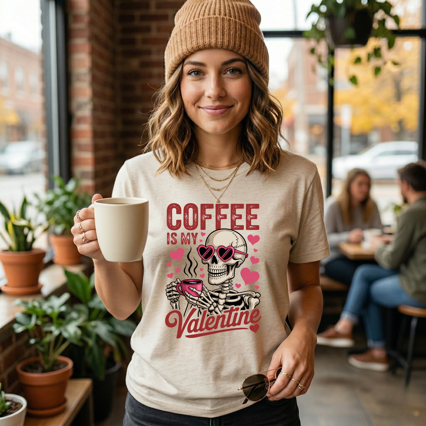 Woman holding a coffee mug wearing a t-shirt with a skeleton design and text in a casual setting. coffee shirt, coffee lover tee, valentine shirt, funny valentine shirt, coffee is my valentine, cute coffee shirt, unisex graphic tee, caffeine shirt, gift for coffee lover, funny t shirt, casual tee, valentines day shirt