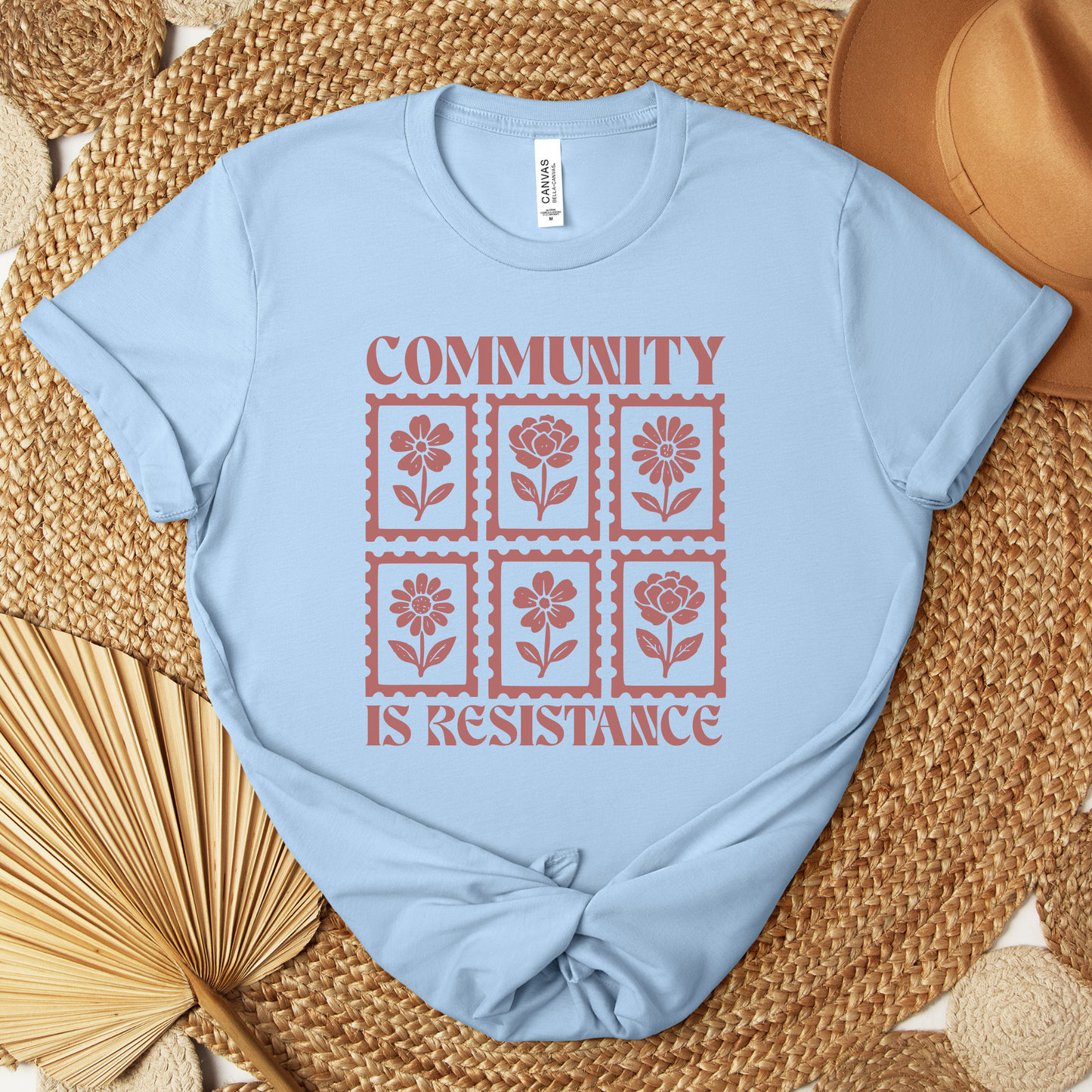 community is resistance shirt, floral stamp shirt, social justice shirt, activist graphic tee, community shirt, protest shirt, unity shirt, mutual aid shirt, progressive apparel, floral activist shirt, statement graphic tee, unisex activist shirt, community care shirt