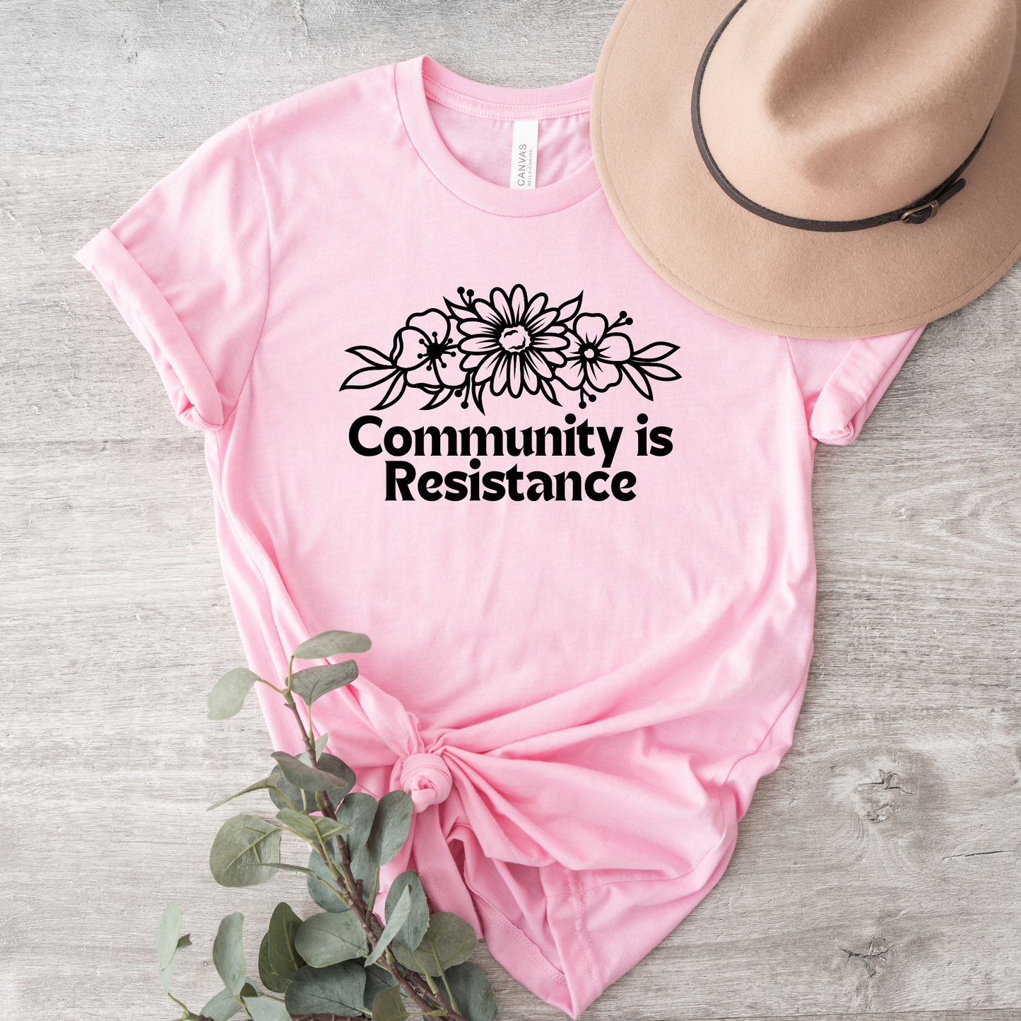 community is resistance shirt, floral resistance graphic tee, community unity floral shirt, resistance floral design t-shirt, activist floral apparel, solidarity floral graphic, community strength floral tee, floral activism shirt, unisex resistance floral top, floral social justice clothing