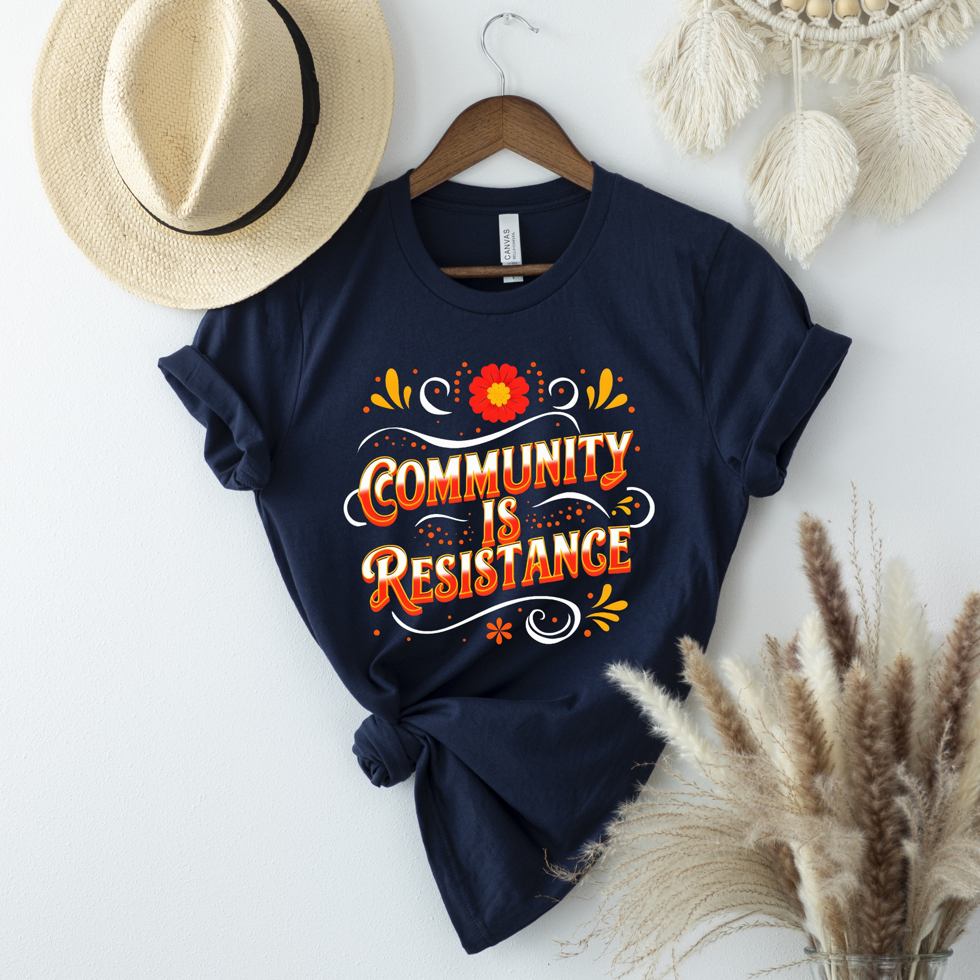 community is resistance shirt, floral resistance graphic tee, community unity floral shirt, resistance floral design t-shirt, activist floral apparel, solidarity floral graphic, community strength floral tee, floral activism shirt, unisex resistance floral top, floral social justice clothing