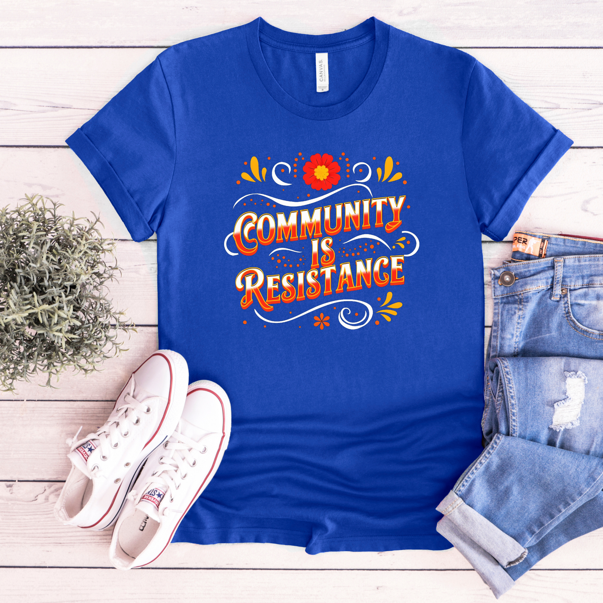 community is resistance shirt, floral resistance graphic tee, community unity floral shirt, resistance floral design t-shirt, activist floral apparel, solidarity floral graphic, community strength floral tee, floral activism shirt, unisex resistance floral top, floral social justice clothing