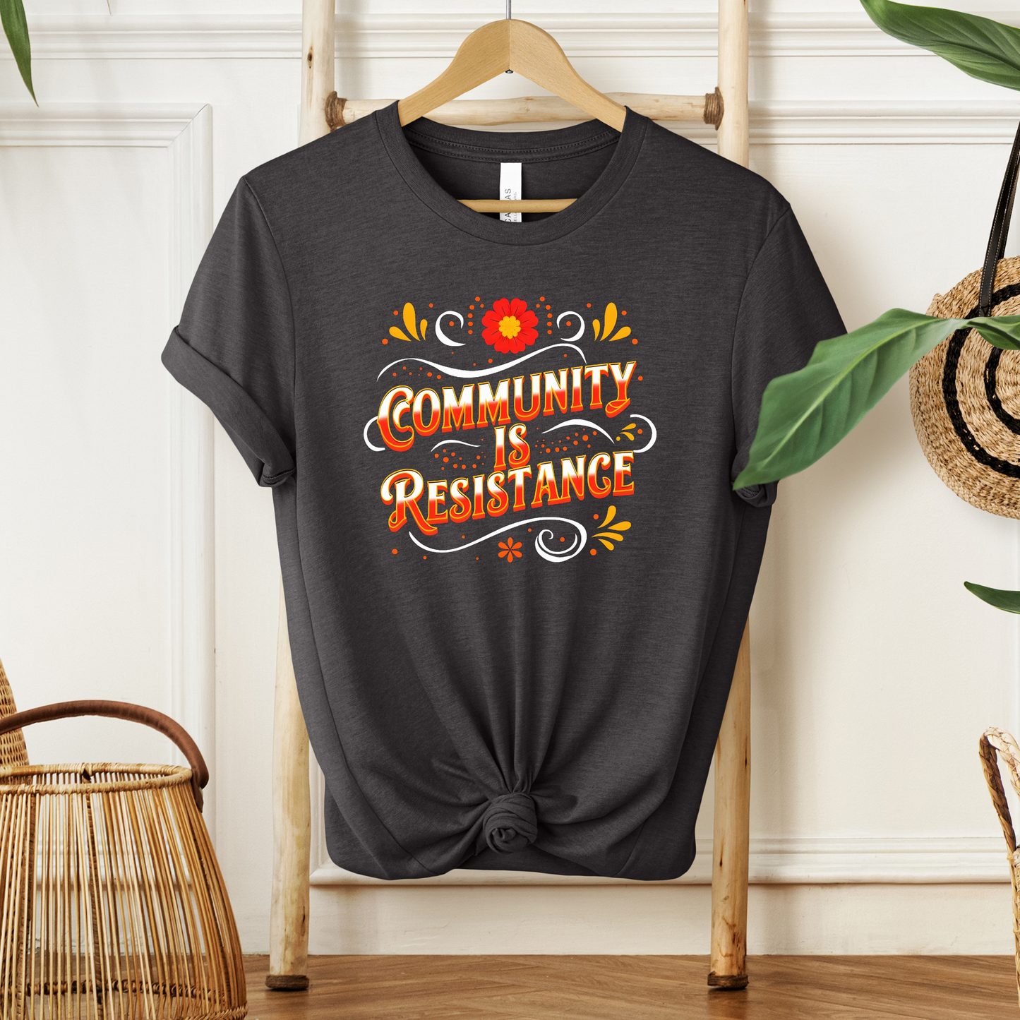community is resistance shirt, floral resistance graphic tee, community unity floral shirt, resistance floral design t-shirt, activist floral apparel, solidarity floral graphic, community strength floral tee, floral activism shirt, unisex resistance floral top, floral social justice clothing