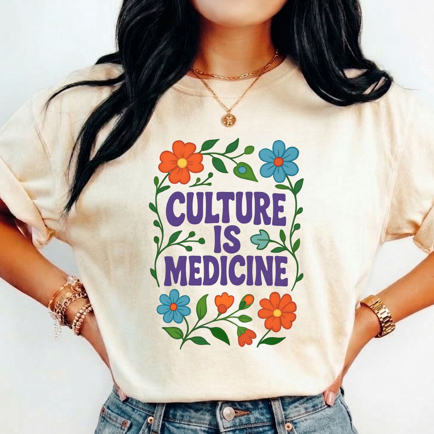 Culture Is Medicine Shirt featuring colorful floral artwork surrounding bold purple lettering. culture is medicine shirt, indigenous shirt, indigenous pride shirt, indigenous apparel, native pride shirt, cultural pride shirt, indigenous history month, national indigenous peoples day, floral shirt, indigenous gift, cultural connection shirt, indigenous woman shirt, reconciliation shirt, indigenous awareness, community shirt, native apparel, indigenous fashion, cultural healing shirt, floral graphic tee