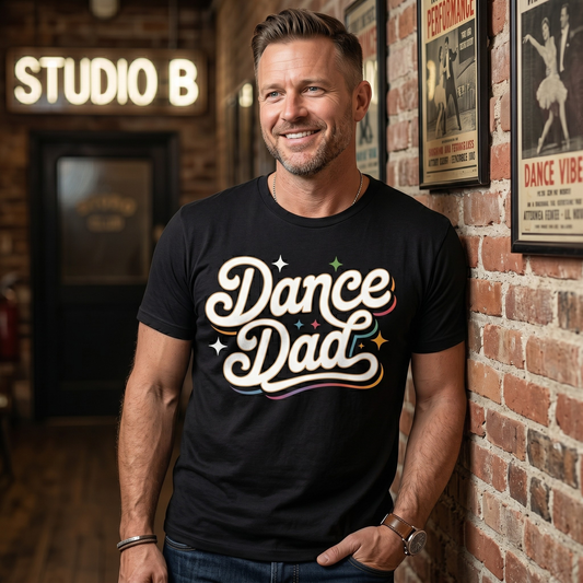 Dance Dad unisex shirt with bold retro typography design on a graphic tee. dance dad shirt, proud dance dad, dance parent tee, unisex graphic tee, recital shirt, competition shirt, dance family apparel, dad gift shirt, retro typography shirt, supportive parent shirt, dance life shirt, father pride tee, everyday graphic tee, performance shirt, dance dad apparel