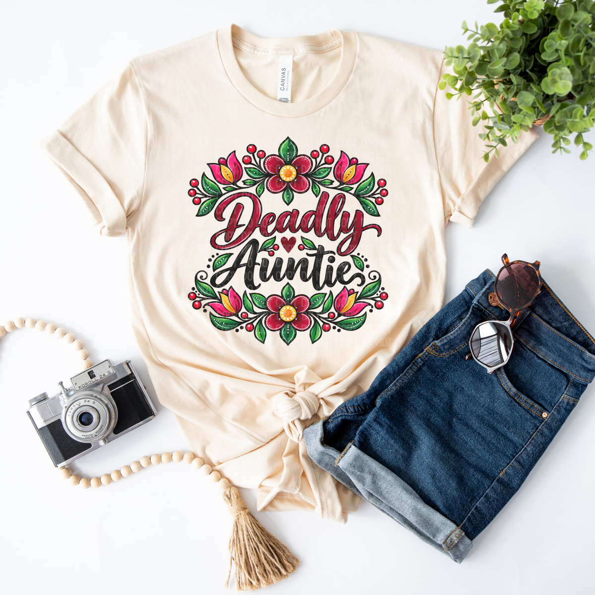 Celebrate your favourite Auntie with our Deadly Auntie Shirt featuring a colourful Indigenous floral-inspired design. Made by an Indigenous-owned family business.