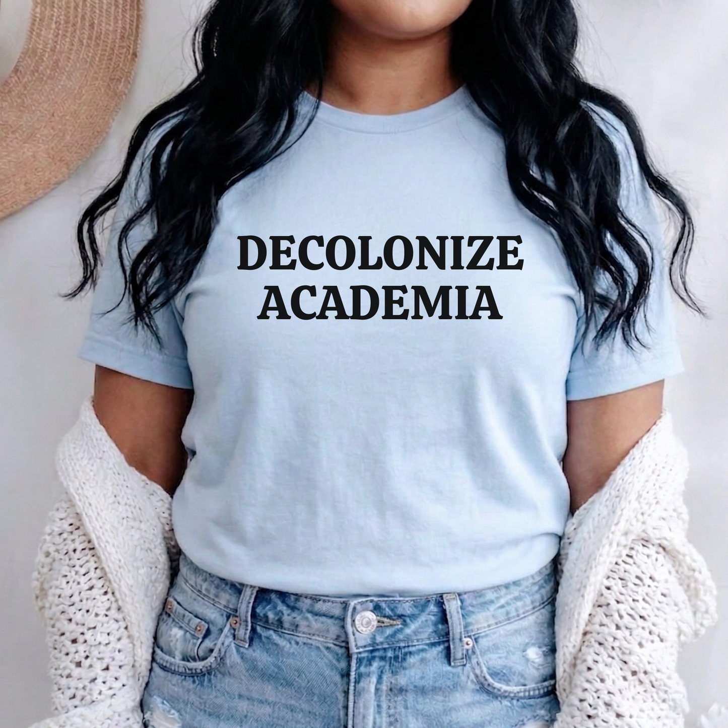 decolonize academia shirt, academic activism shirt, social justice tee, statement graphic tee, unisex protest shirt, educator shirt, student activism apparel, minimalist text shirt, black and white text shirt, inclusive education shirt, campus wear tee, anti colonial shirt, meaningful statement shirt, activism clothing, unisex graphic tee