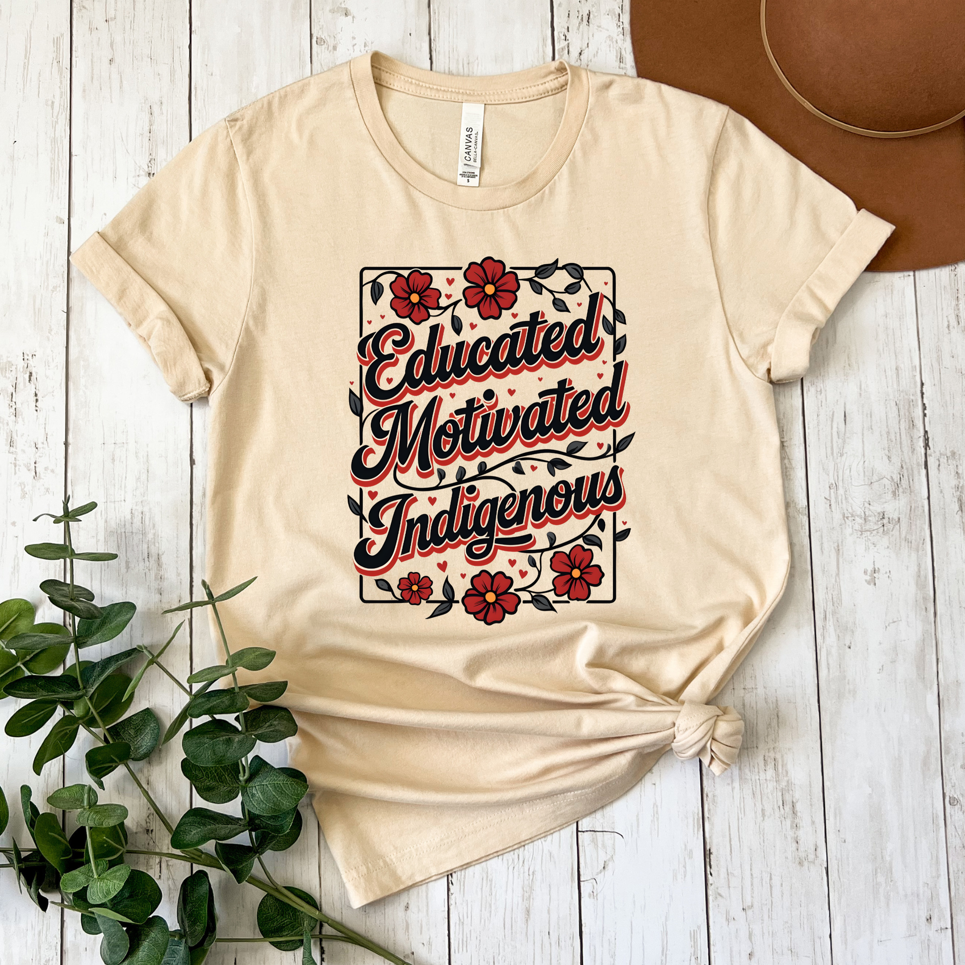 educated Motivated Indigenous graphic t-shirt with red flowers and vines, Indigenous empowerment design