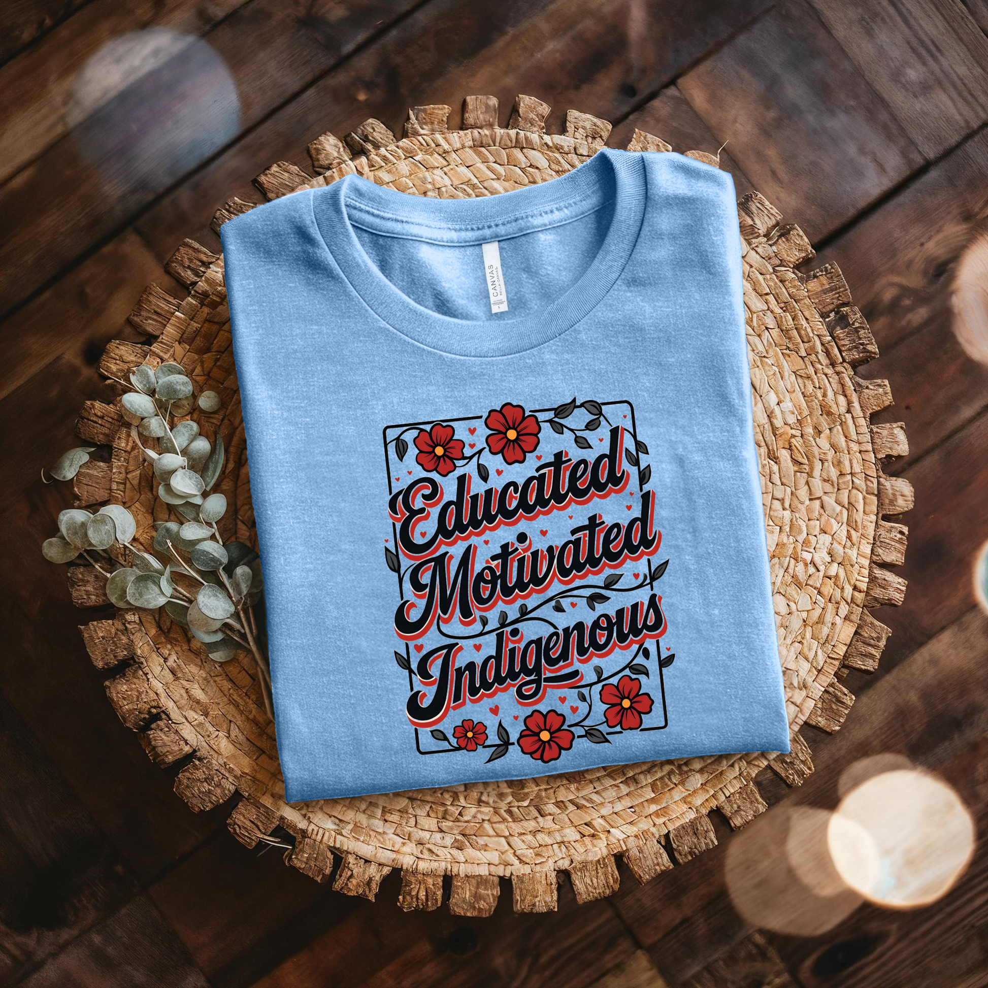 educated Motivated Indigenous graphic t-shirt with red flowers and vines, Indigenous empowerment design