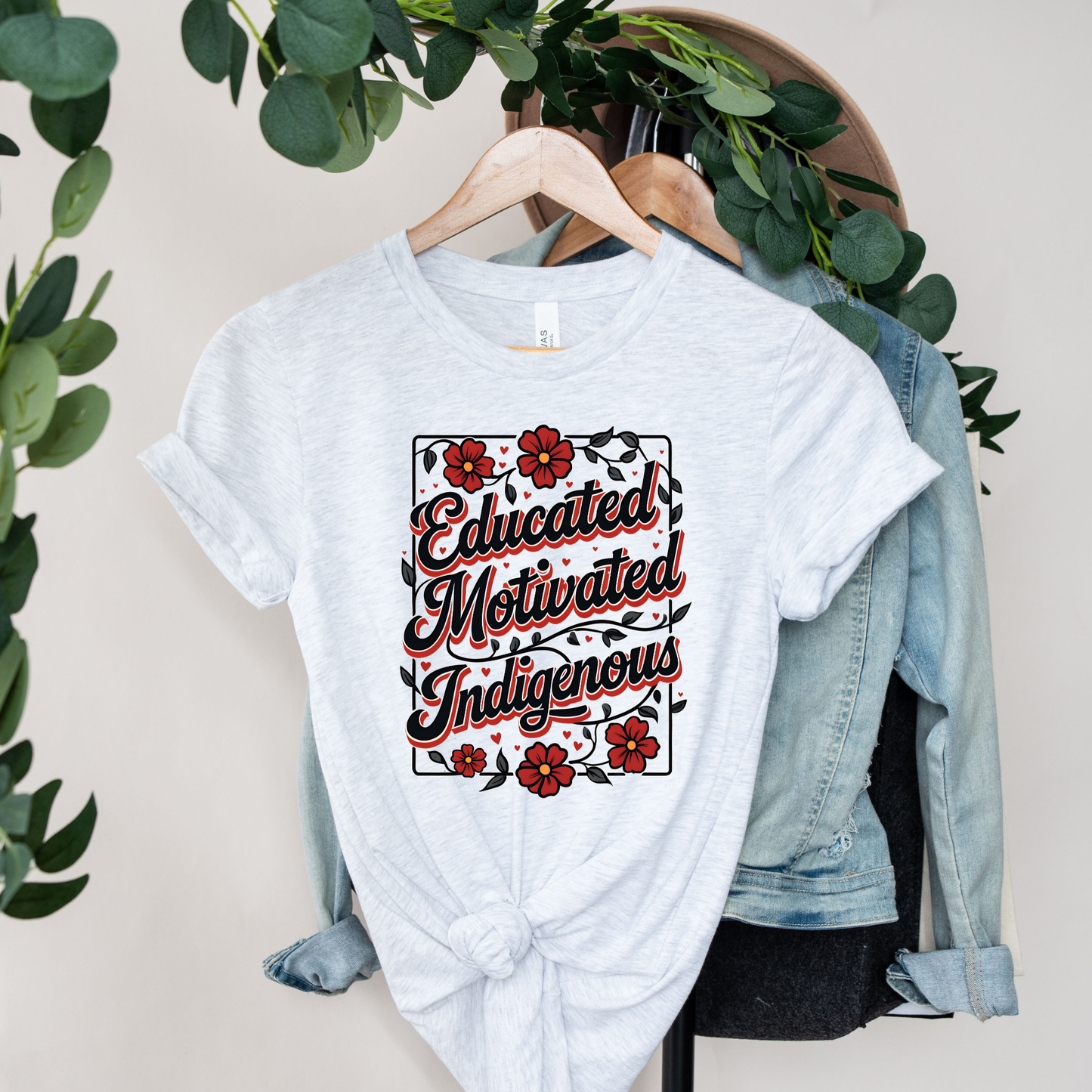 educated Motivated Indigenous graphic t-shirt with red flowers and vines, Indigenous empowerment design