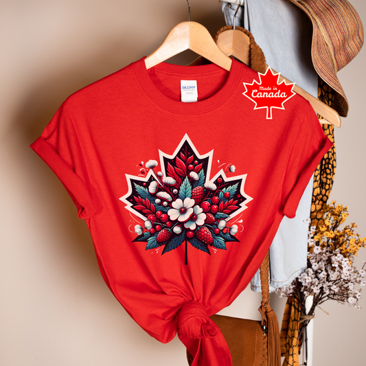 Red Canada Day shirt featuring a maple leaf filled with flowers, berries, and botanical elements inspired by Canada's natural beauty. Floral Canada Flag Shirt, Canada Day Shirt, Maple Leaf Floral Shirt, Canadian Pride Shirt, Made in Canada Apparel, Canada Graphic Tee, Botanical Maple Leaf Shirt, Berry Floral Shirt, Canadian Nature Shirt, Canada Day Clothing