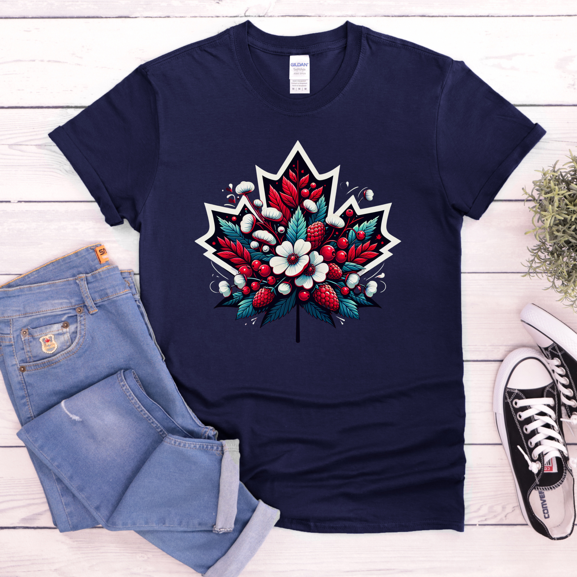 Red Canada Day shirt featuring a maple leaf filled with flowers, berries, and botanical elements inspired by Canada's natural beauty. Floral Canada Flag Shirt, Canada Day Shirt, Maple Leaf Floral Shirt, Canadian Pride Shirt, Made in Canada Apparel, Canada Graphic Tee, Botanical Maple Leaf Shirt, Berry Floral Shirt, Canadian Nature Shirt, Canada Day Clothing
