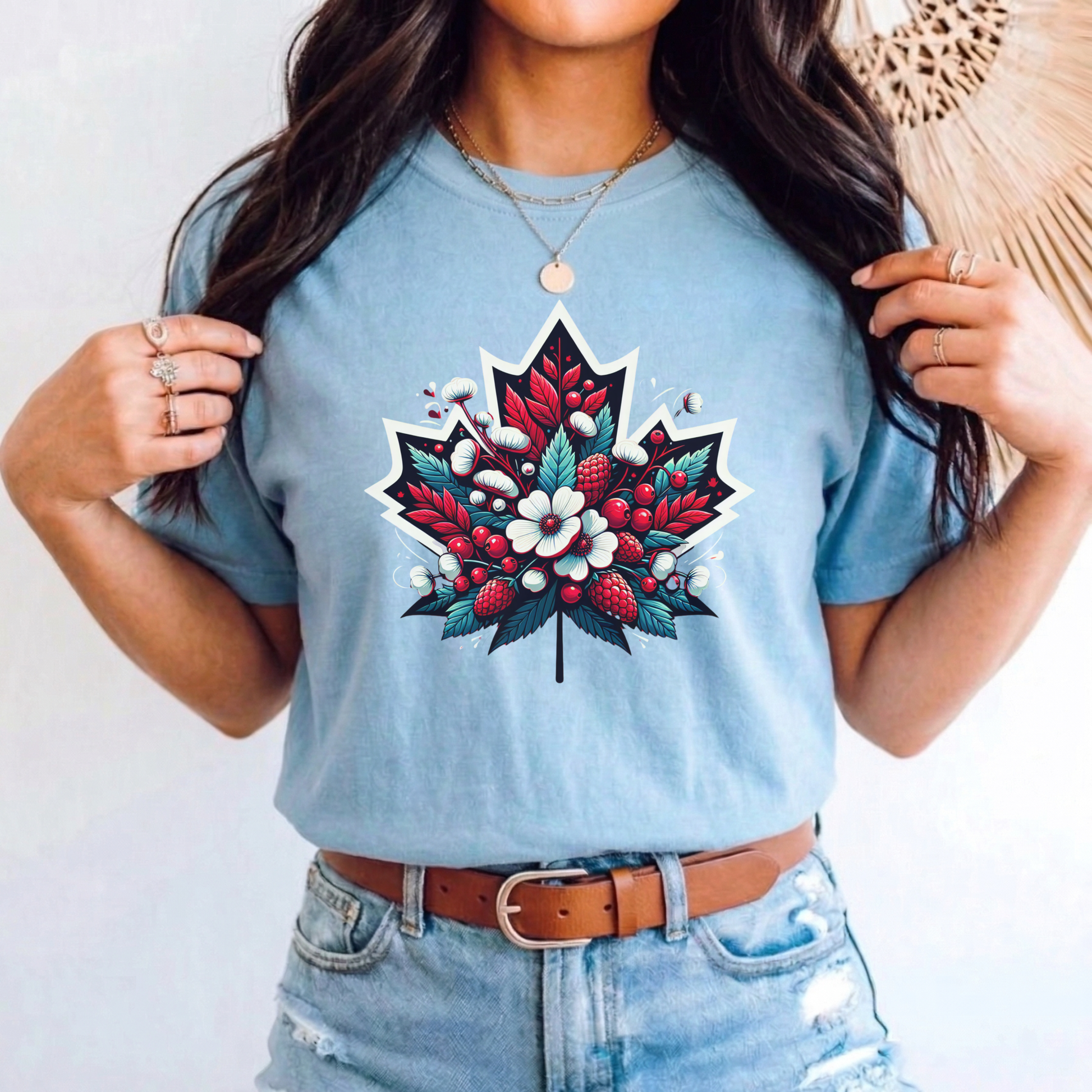 Red Canada Day shirt featuring a maple leaf filled with flowers, berries, and botanical elements inspired by Canada's natural beauty. Floral Canada Flag Shirt, Canada Day Shirt, Maple Leaf Floral Shirt, Canadian Pride Shirt, Made in Canada Apparel, Canada Graphic Tee, Botanical Maple Leaf Shirt, Berry Floral Shirt, Canadian Nature Shirt, Canada Day Clothing