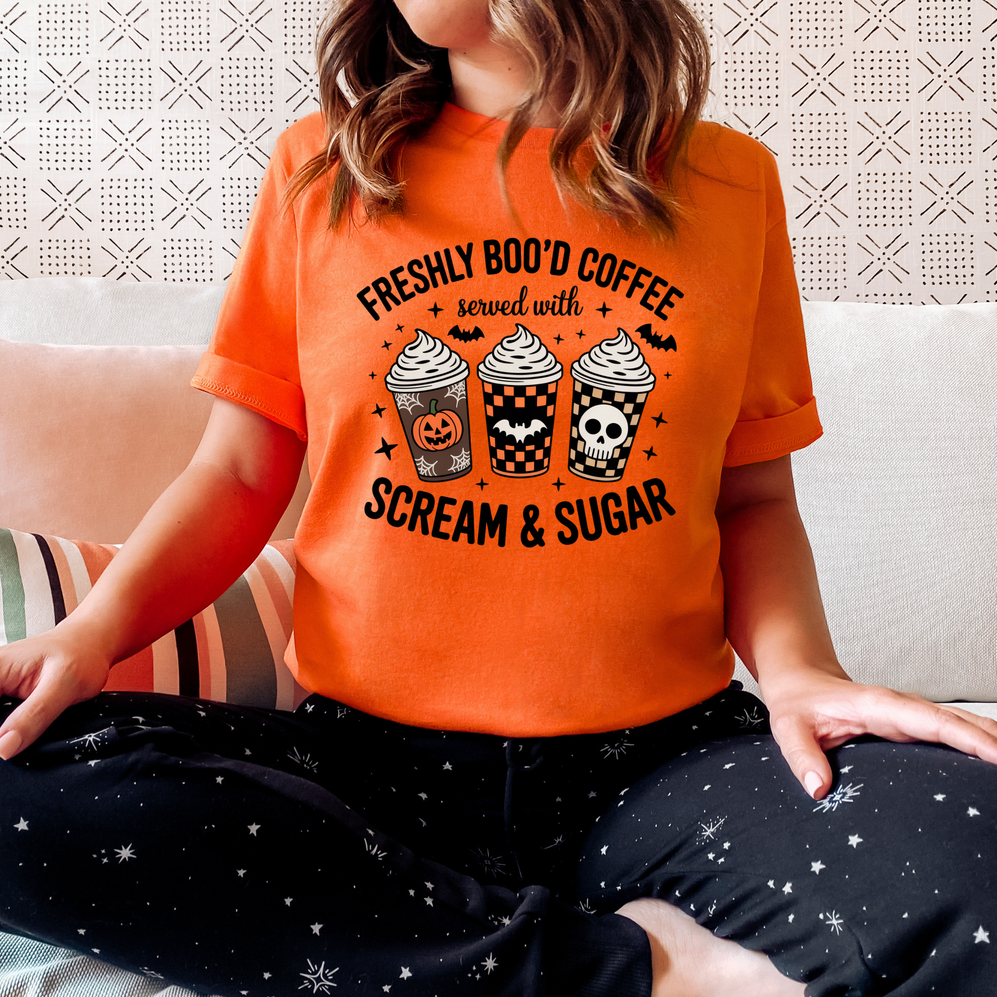 Funny Halloween coffee shirt featuring three festive coffee cups with pumpkins, bats, checkerboard patterns, and skull artwork that reads "Freshly Boo'd Coffee Served With Scream & Sugar." freshly boo'd coffee shirt, scream and sugar shirt, halloween coffee shirt, spooky coffee shirt, coffee lover halloween shirt, pumpkin spice shirt, fall coffee shirt, cute halloween tee, halloween graphic tee, spooky season shirt, pumpkin patch outfit, coffee addict shirt, funny coffee shirt, halloween apparel