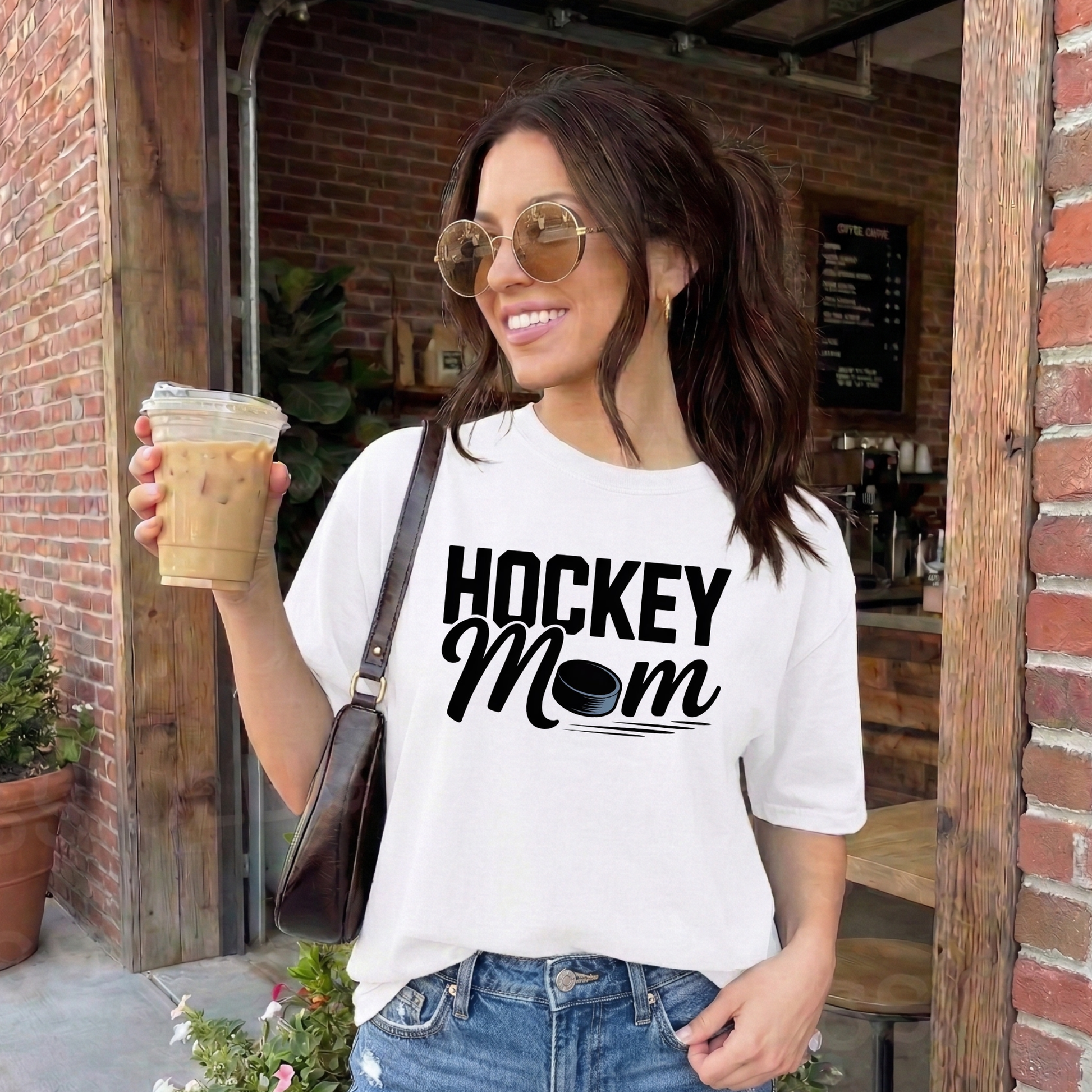 Hockey Mom shirt with a hockey puck graphic on a unisex graphic tee. hockey mom shirt, hockey parent tee, sports mom shirt, unisex graphic tee, hockey fan apparel, game day shirt, hockey life shirt, funny mom shirt, puck shirt, tournament shirt, practice shirt, mom gift tee, hockey family apparel, everyday casual tee, proud hockey mom