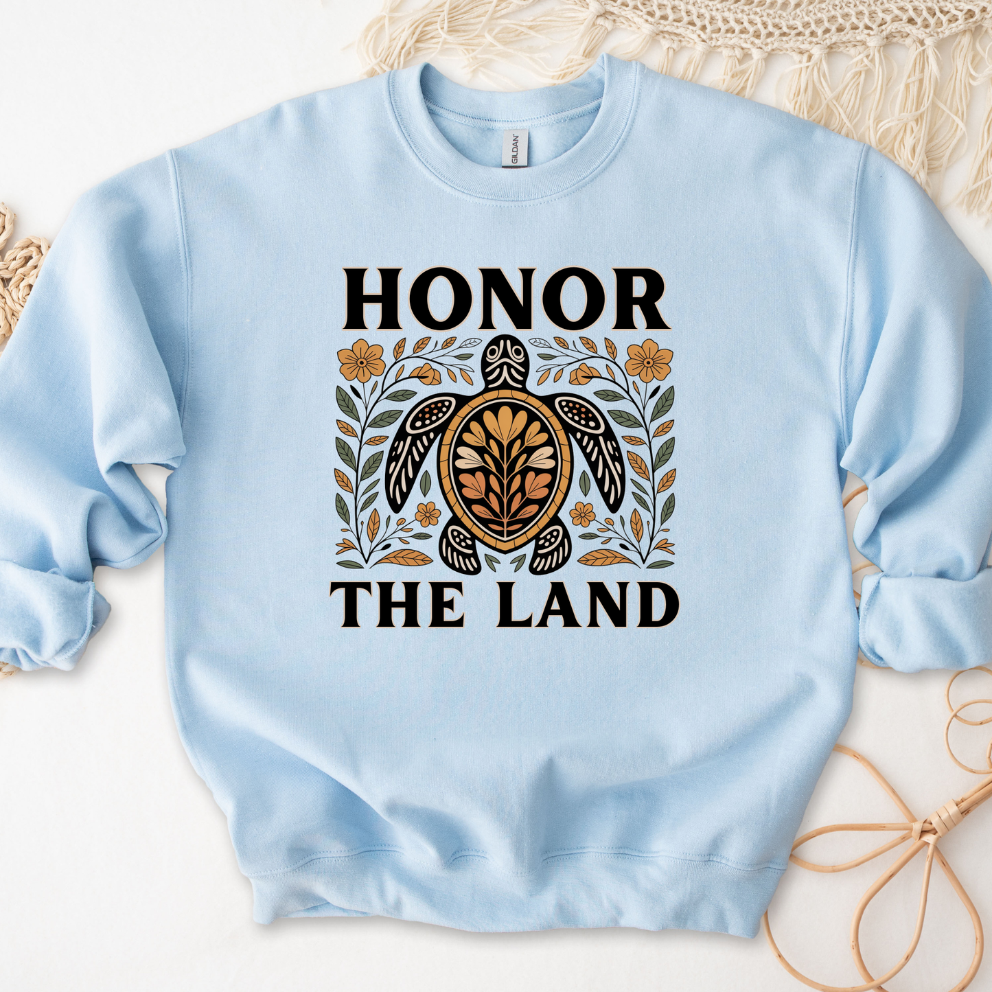 sweatshirt with 'Honor the Land' design, honor the land turtle sweatshirt, indigenous turtle floral crewneck, indigenous designed fleece, land defender sweatshirt, turtle symbolism indigenous apparel, floral turtle sweatshirt, indigenous environmental hoodie, honor the land pullover, unisex indigenous sweatshirt, sahdeh spruce crewneck, cultural pride turtle fleece, native land stewardship shirt