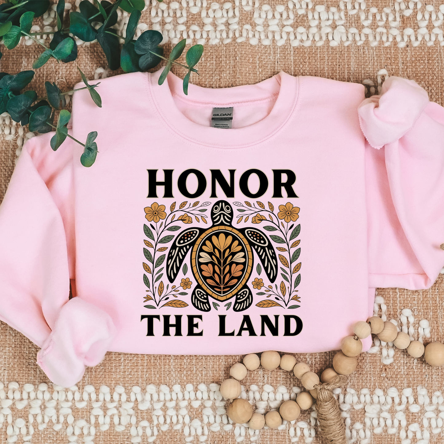 sweatshirt with 'Honor the Land' design, honor the land turtle sweatshirt, indigenous turtle floral crewneck, indigenous designed fleece, land defender sweatshirt, turtle symbolism indigenous apparel, floral turtle sweatshirt, indigenous environmental hoodie, honor the land pullover, unisex indigenous sweatshirt, sahdeh spruce crewneck, cultural pride turtle fleece, native land stewardship shirt