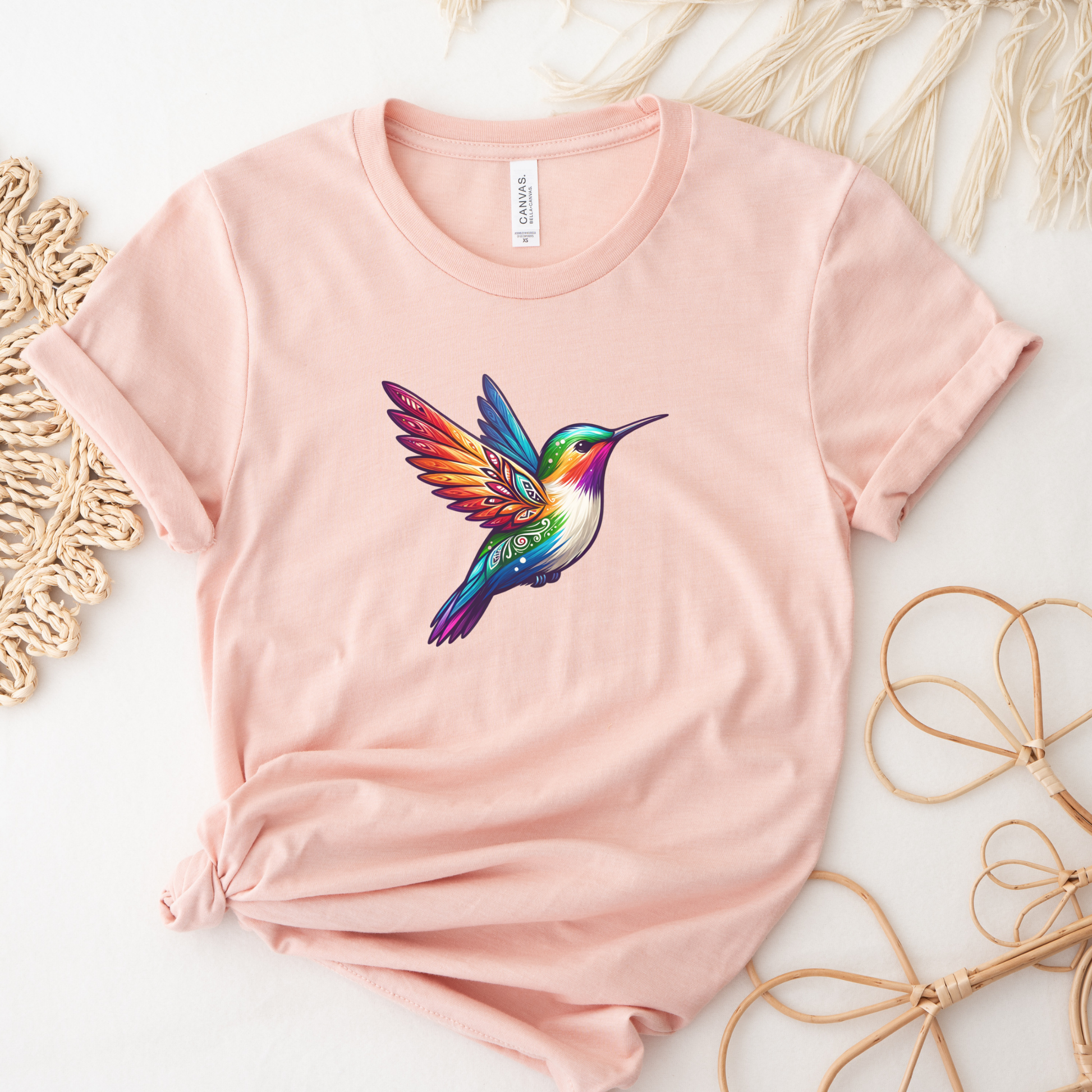 Colourful Indigenous Pride hummingbird design on t-shirt featuring rainbow feathers and Indigenous-inspired artwork. Indigenous Pride Shirt, Indigenous Hummingbird Shirt, LGBTQ2S+ Indigenous Apparel, Pride Hummingbird Tee, Indigenous Clothing Canada, Rainbow Hummingbird Shirt, Indigenous Designed Apparel, Native Pride Shirt, Indigenous LGBTQ Shirt