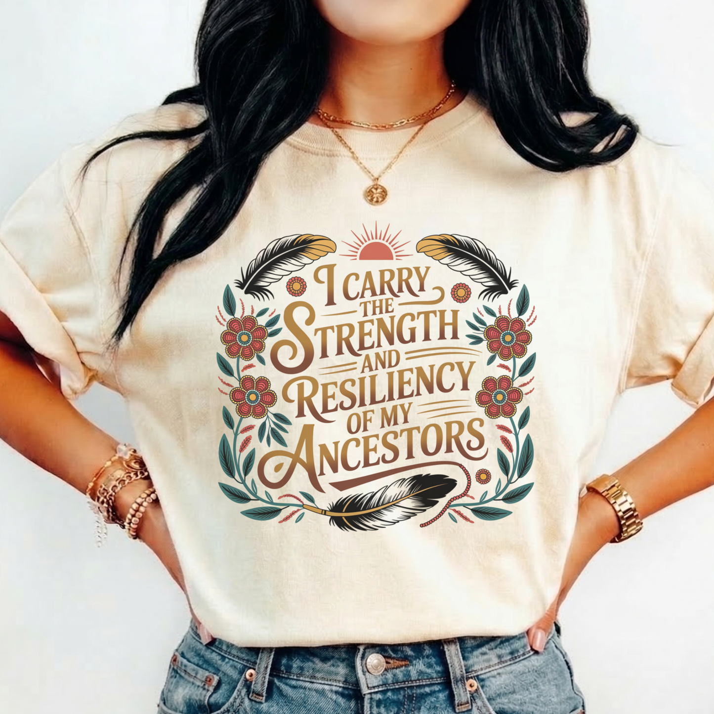 Person wearing a beige t-shirt with a motivational quote design. indigenous shirt, ancestor strength shirt, resiliency shirt, indigenous inspired apparel, meaningful t shirts, strength quote shirt, heritage shirt, empowerment shirt, cultural awareness clothing, statement t shirt, social justice apparel, unity shirt, inspirational shirt, ally shirt, conscious fashion