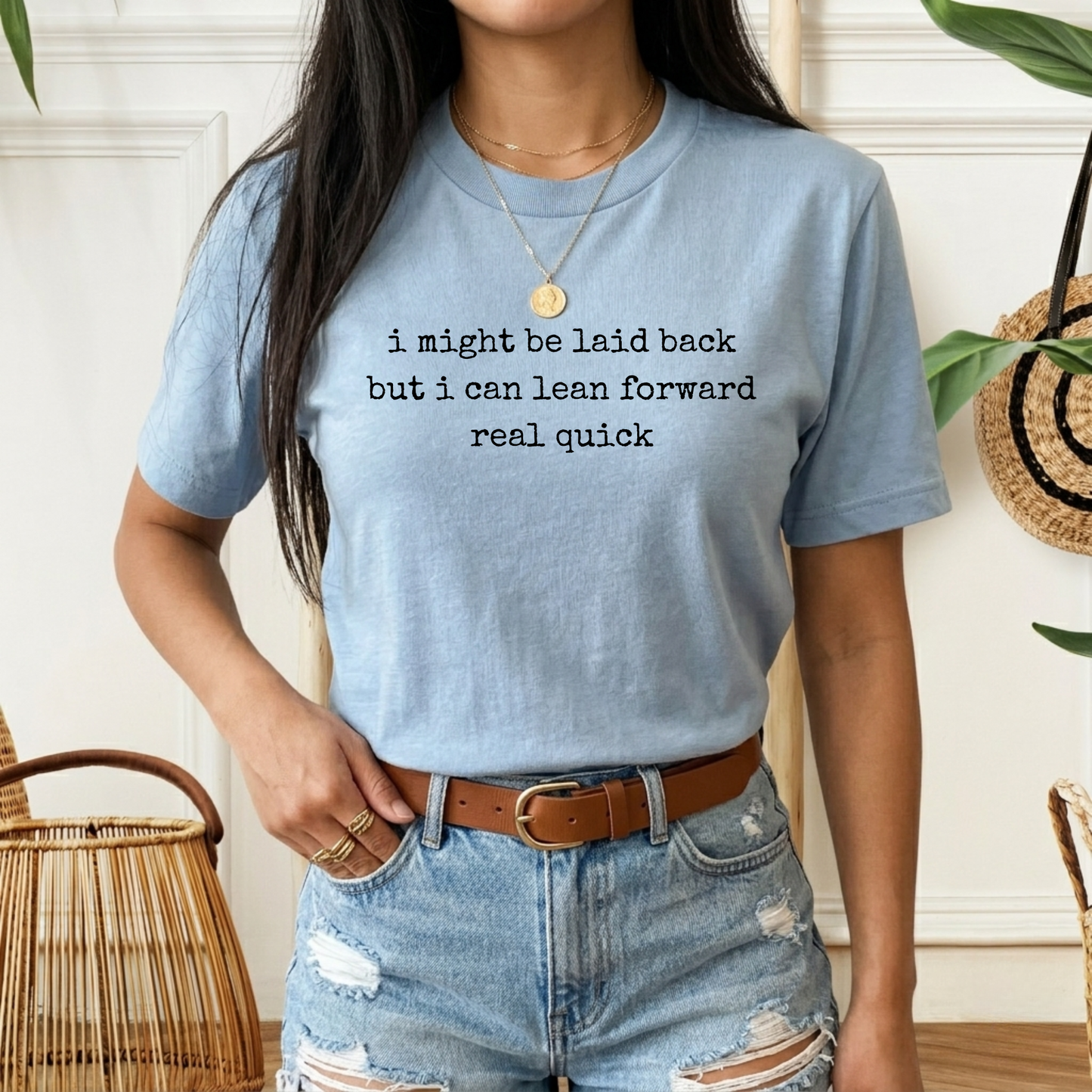 blue t-shirt with a humorous text quote, I might be laid back but I can lean forward real quick shirt, sassy attitude t-shirt, funny motivational tee, unisex humor graphic shirt, quick reaction t-shirt, chill vibe attitude tee, bold typography casual shirt, gym motivation shirt, sarcastic everyday tee, indigenous owned funny shirt, laid back strength apparel, real quick response graphic