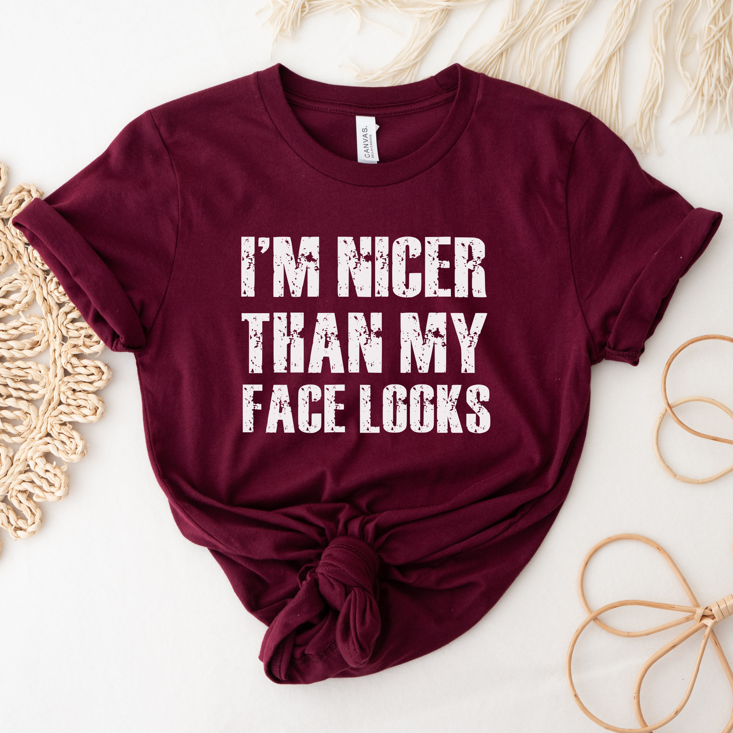 graphic t-shirt with distressed grunge text reading I’m Nicer Than My Face Looks. Funny graphic tee, sarcastic shirt, grunge text shirt, introvert shirt, funny saying t-shirt, vintage grunge tee, resting face shirt, funny women’s graphic tee, sarcastic apparel, trendy graphic shirt