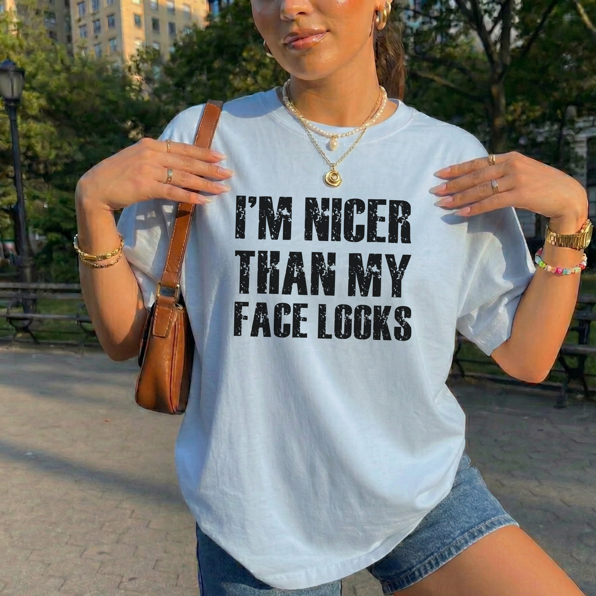 graphic t-shirt with distressed grunge text reading I’m Nicer Than My Face Looks. Funny graphic tee, sarcastic shirt, grunge text shirt, introvert shirt, funny saying t-shirt, vintage grunge tee, resting face shirt, funny women’s graphic tee, sarcastic apparel, trendy graphic shirt