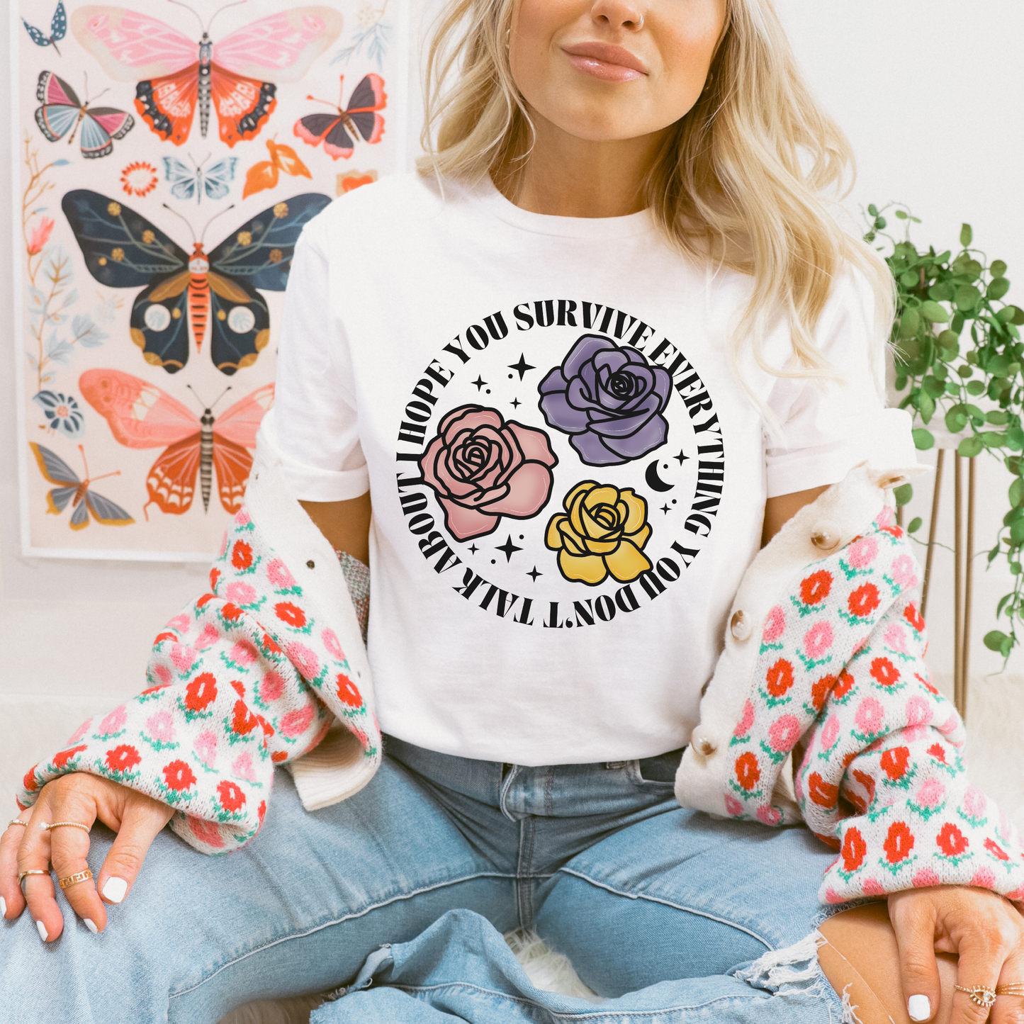 Inspirational floral shirt design featuring three roses in pink, lavender, and yellow with the phrase "I Hope You Survive Everything You Don't Talk About." Mental Health Awareness, Inspirational Shirt, Floral Shirt, Rose Shirt, Encouragement Gift, Self Care Apparel, Positive Message Tee, Inspirational Tee, Floral Graphic Shirt, Unisex T-Shirt, Wellness Apparel, Support Gift, Meaningful Clothing, Floral Fashion, Motivational Shirt, Kindness Matters, Mental Health Support, Graphic Tee, Gift For Her, Gift For 