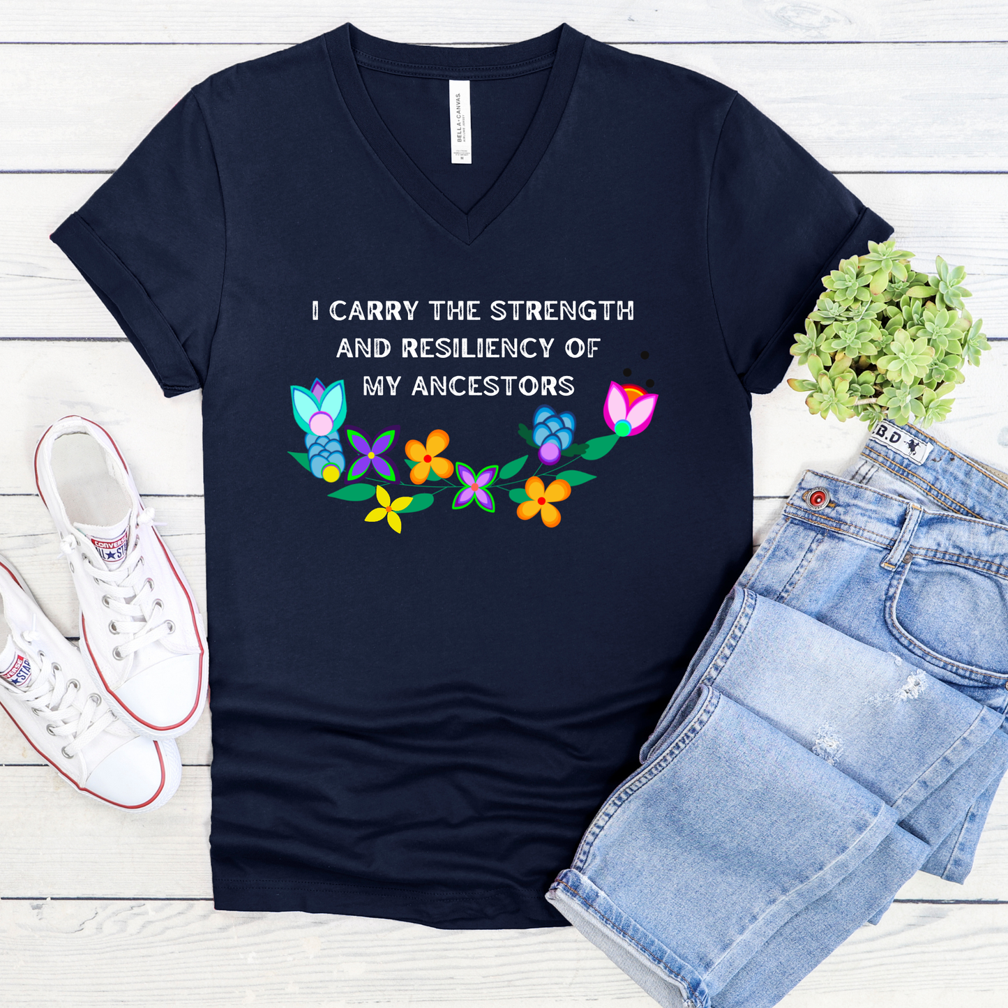 Indigenous ancestors vneck shirt, I carry the strength of my ancestors shirt, Indigenous affirmation tee, Indigenous floral shirt, ancestral strength t‑shirt, Native resilience shirt, cultural pride shirt, Indigenous‑owned clothing, Dene floral design shirt, motivational Indigenous graphic tee.