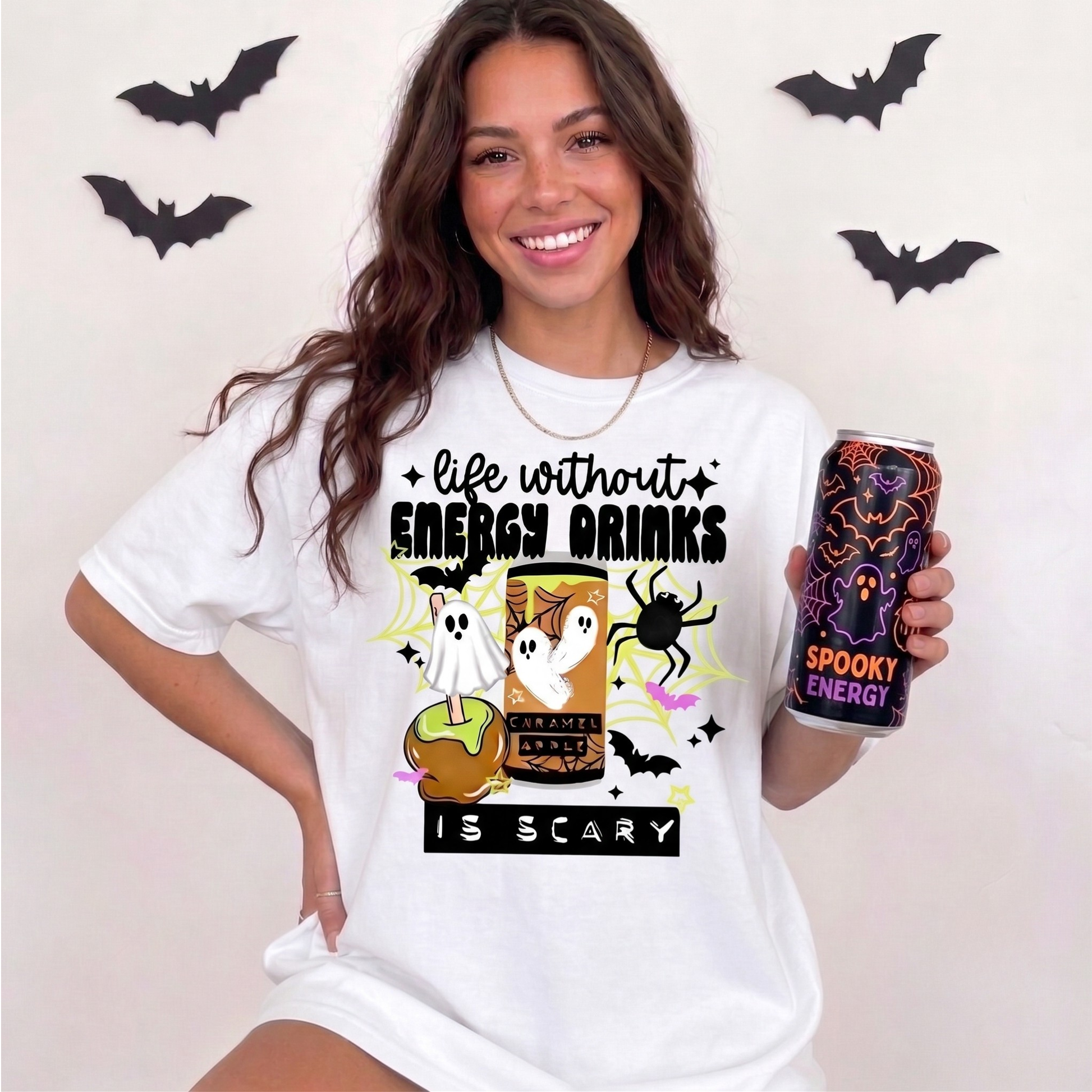 Funny Life Without Energy Drinks Is Scary Halloween shirt with ghosts, bats, spider webs, caramel apple, and spooky energy drink design. life without energy drinks is scary shirt, funny halloween shirt, energy drink shirt, caffeine lover shirt, halloween ghost shirt, spooky season shirt, funny fall shirt, halloween graphic tee, gamer shirt, nurse halloween shirt, teacher halloween shirt, student shirt, caffeine addict shirt, halloween apparel, caramel apple shirt, ghost aesthetic shirt, spooky cute shirt