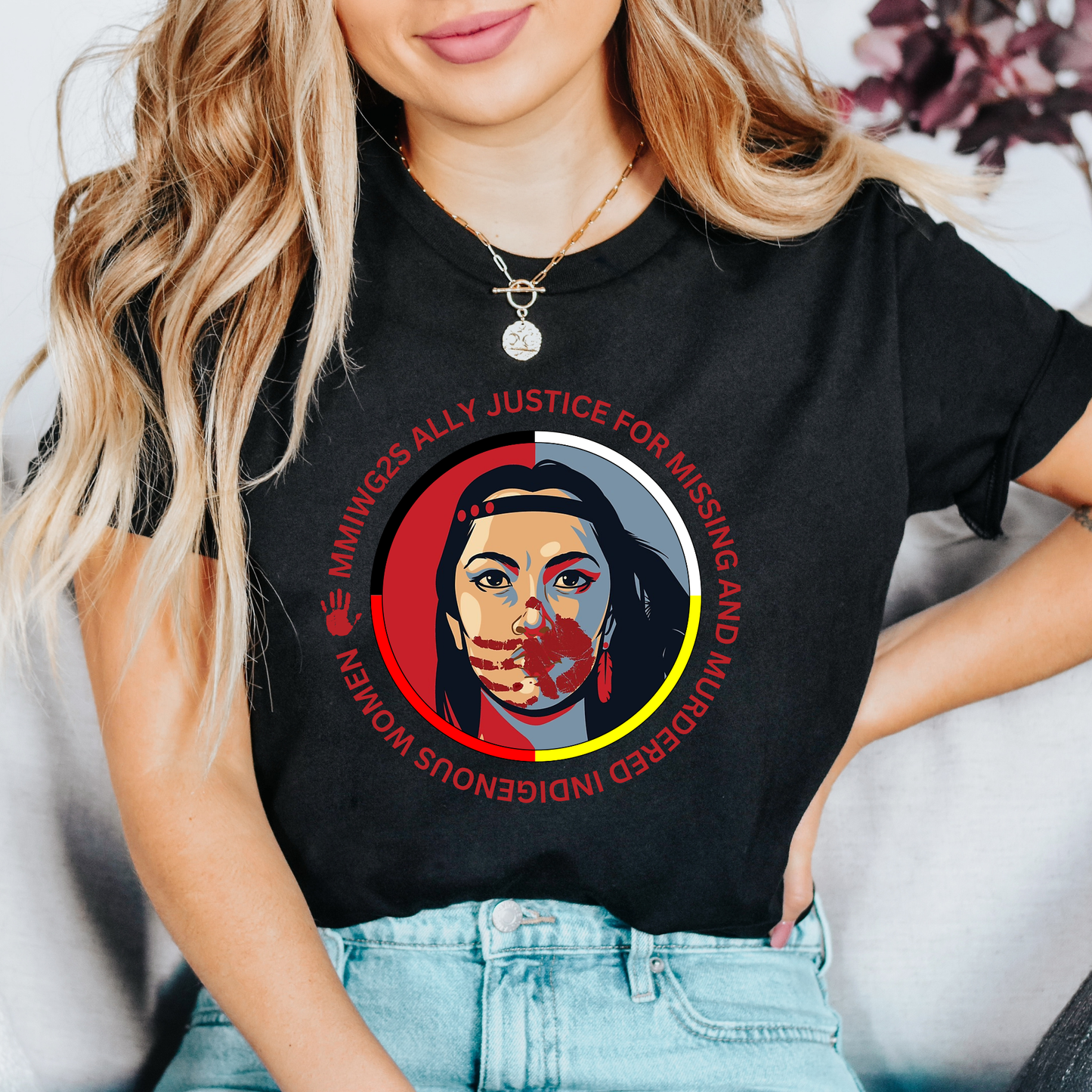 Person wearing a black t-shirt with a graphic design and text related to missing and murdered Indigenous women. MMIWG2S shirt, Missing Murdered Indigenous Women tee, Indigenous ally shirt, MMIWG awareness apparel, justice for Indigenous women clothing, truth and reconciliation tee, National Day for Truth shirt, Indigenous activism clothing, 2SLGBTQQIA ally shirt, Canada missing women awareness, social justice tee, rally shirt Indigenous rights, solidarity shirt, awareness apparel Indigenous, activism t-shir