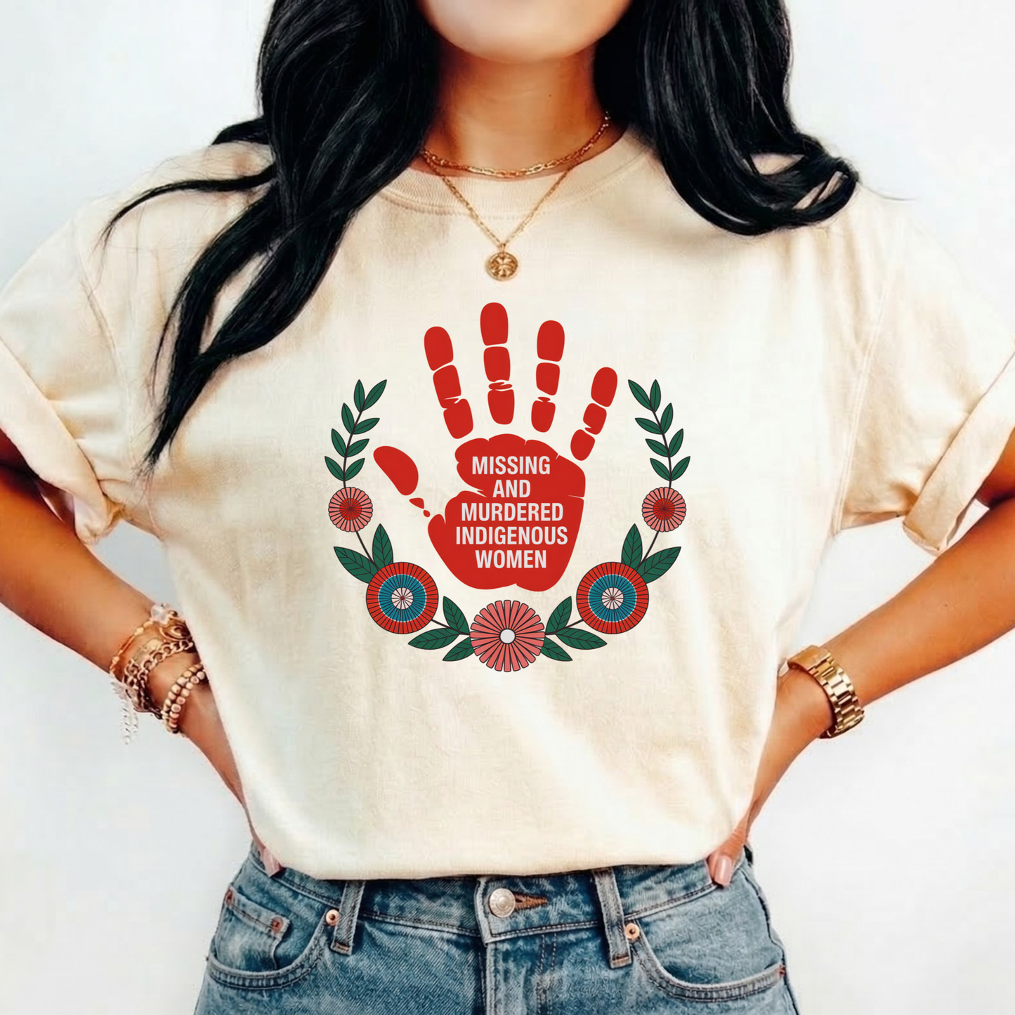 Person wearing a cream t-shirt with a red handprint design and text on a white background. MMIW shirt, Missing and Murdered Indigenous Women shirt, red handprint shirt, Indigenous awareness shirt, Indigenous rights shirt, MMIW awareness tee, solidarity shirt, social justice shirt, unisex awareness shirt, Canada Indigenous shirt, Indigenous activism clothing, reconciliation shirt, advocate shirt, meaningful graphic tee, awareness apparel