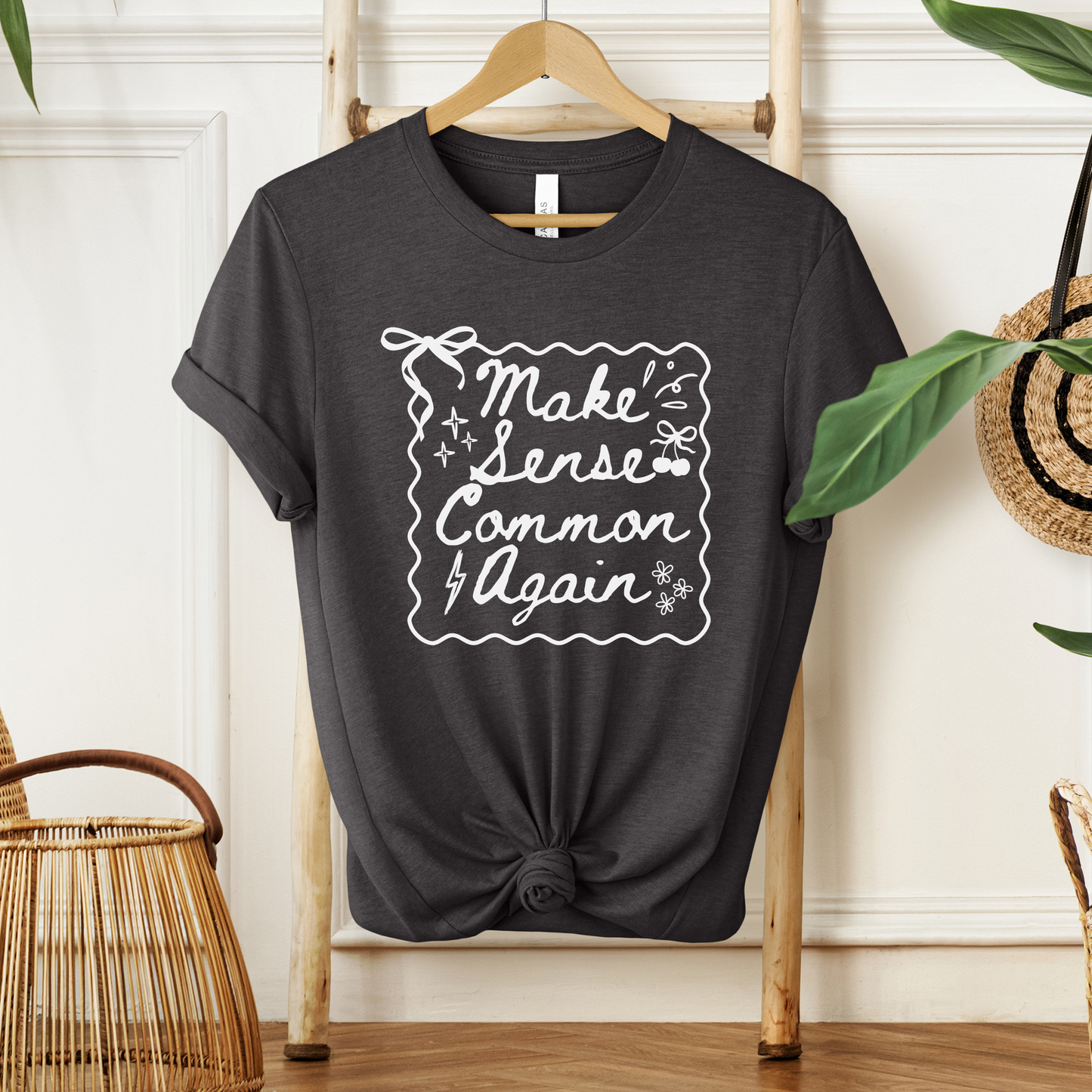 Make Sense Common Again shirt with hand-drawn doodle style text on a unisex graphic tee. make sense common again, funny quote shirt, sarcastic tee, doodle shirt, unisex graphic tee, humorous apparel, witty shirt, statement tee, casual funny shirt, everyday graphic tee, gift idea shirt, sarcastic quote tee, playful t shirt, funny unisex shirt, creative quote shirt. canadian shop funny shirt