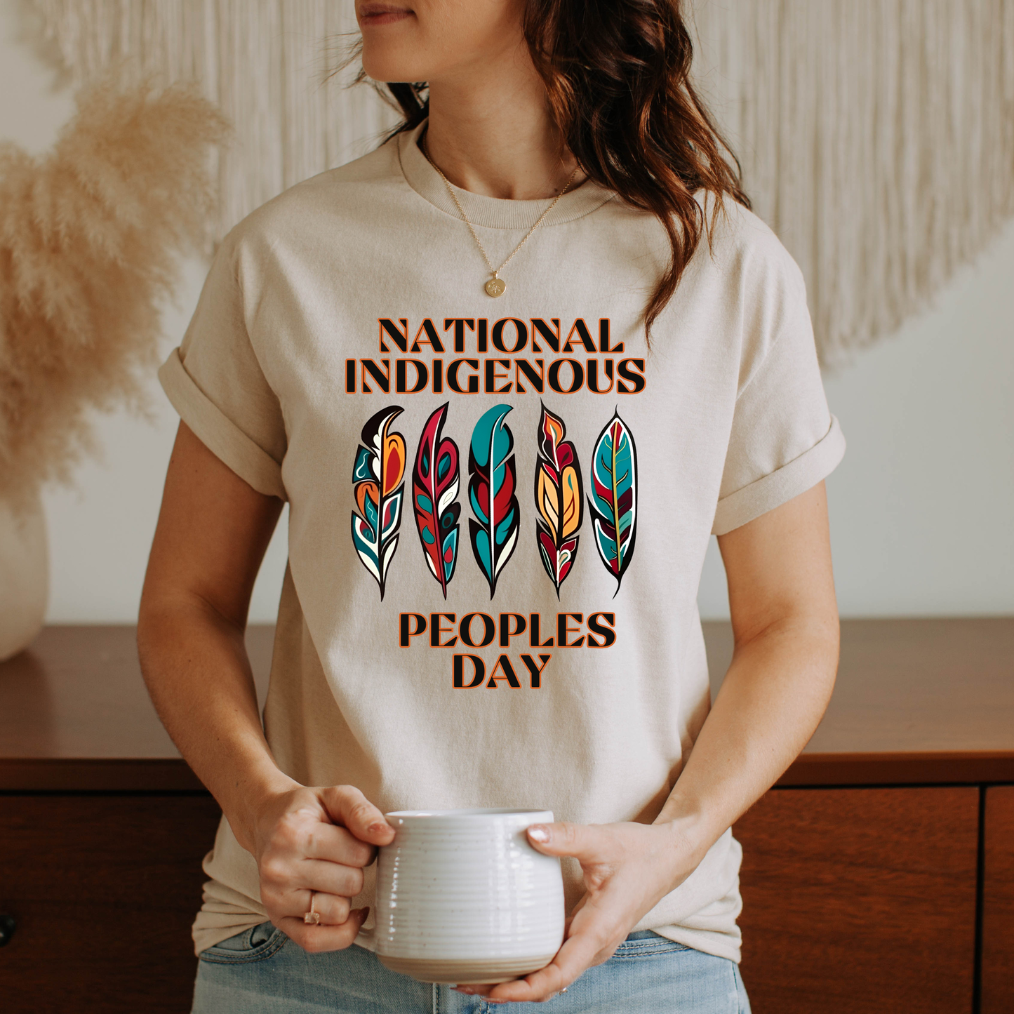 National Indigenous Peoples Day unisex t-shirt with feather graphic design on a comfortable everyday tee. National Indigenous Peoples Day shirt, Indigenous pride tee, feather shirt, unisex graphic tee, Indigenous apparel, cultural pride shirt, meaningful graphic tee, Indigenous celebration shirt, everyday unisex shirt, heritage clothing, awareness shirt, gift for Indigenous peoples day, feather design tee, casual cultural shirt, Indigenous day apparel, Indigenous history month shirt, Indigenous owned 