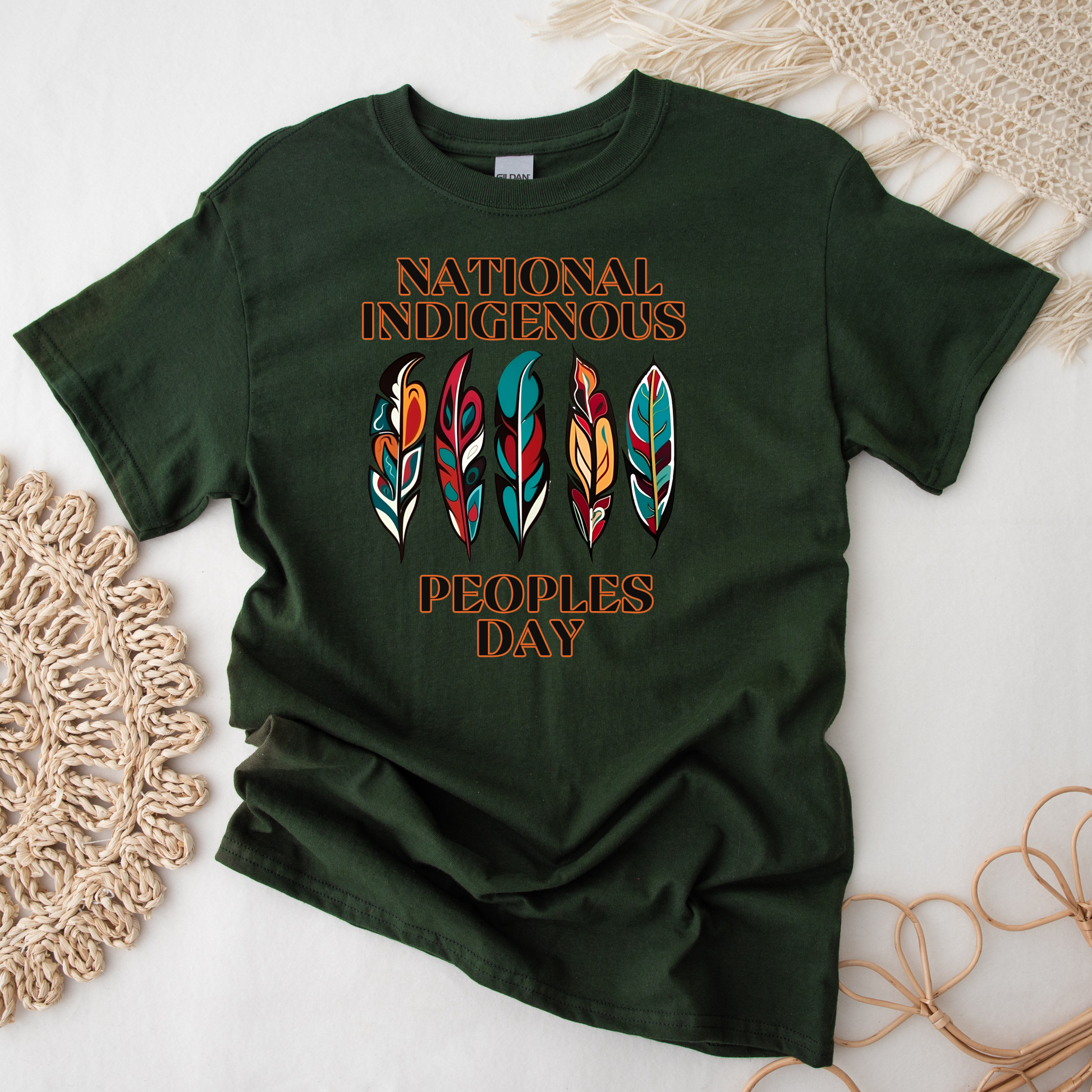 National Indigenous Peoples Day unisex t-shirt with feather graphic design on a comfortable everyday tee. National Indigenous Peoples Day shirt, Indigenous pride tee, feather shirt, unisex graphic tee, Indigenous apparel, cultural pride shirt, meaningful graphic tee, Indigenous celebration shirt, everyday unisex shirt, heritage clothing, awareness shirt, gift for Indigenous peoples day, feather design tee, casual cultural shirt, Indigenous day apparel, Indigenous history month shirt, Indigenous owned 
