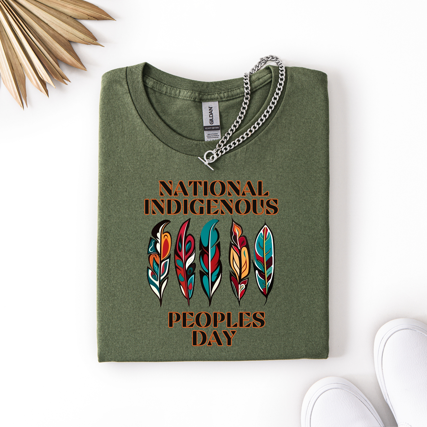 National Indigenous Peoples Day unisex t-shirt with feather graphic design on a comfortable everyday tee. National Indigenous Peoples Day shirt, Indigenous pride tee, feather shirt, unisex graphic tee, Indigenous apparel, cultural pride shirt, meaningful graphic tee, Indigenous celebration shirt, everyday unisex shirt, heritage clothing, awareness shirt, gift for Indigenous peoples day, feather design tee, casual cultural shirt, Indigenous day apparel, Indigenous history month shirt, Indigenous owned 